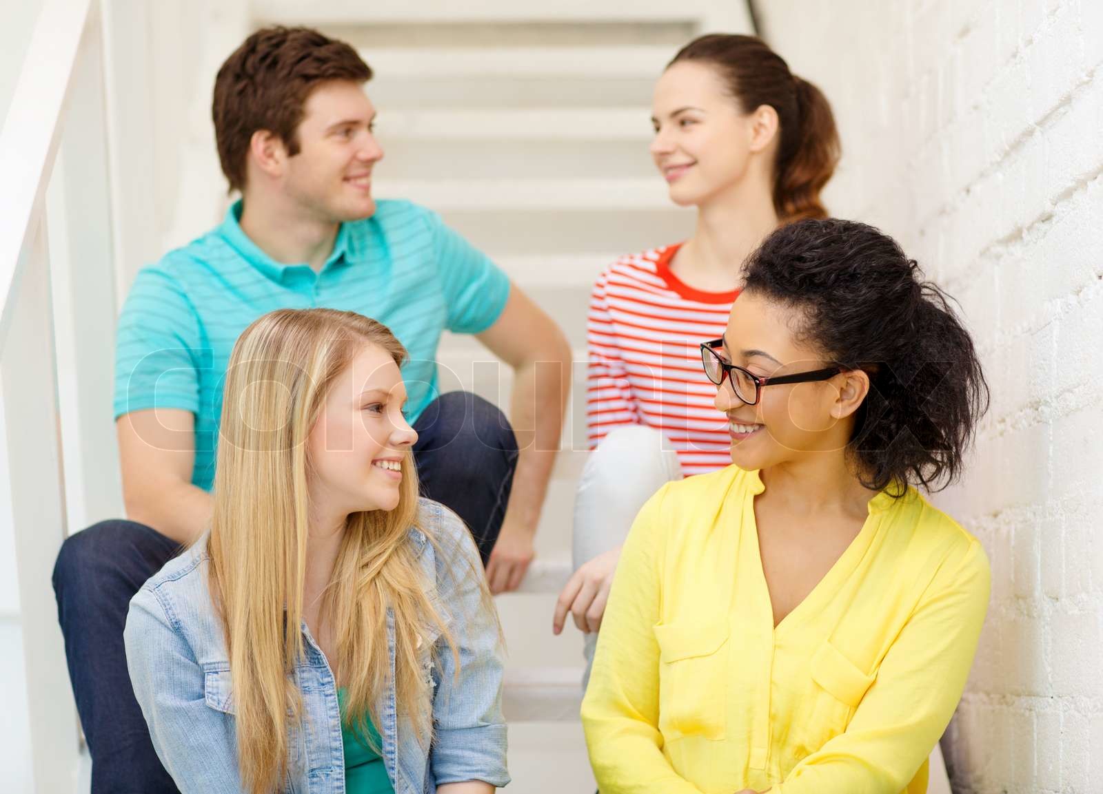 smiling teenagers hanging out | Stock image | Colourbox