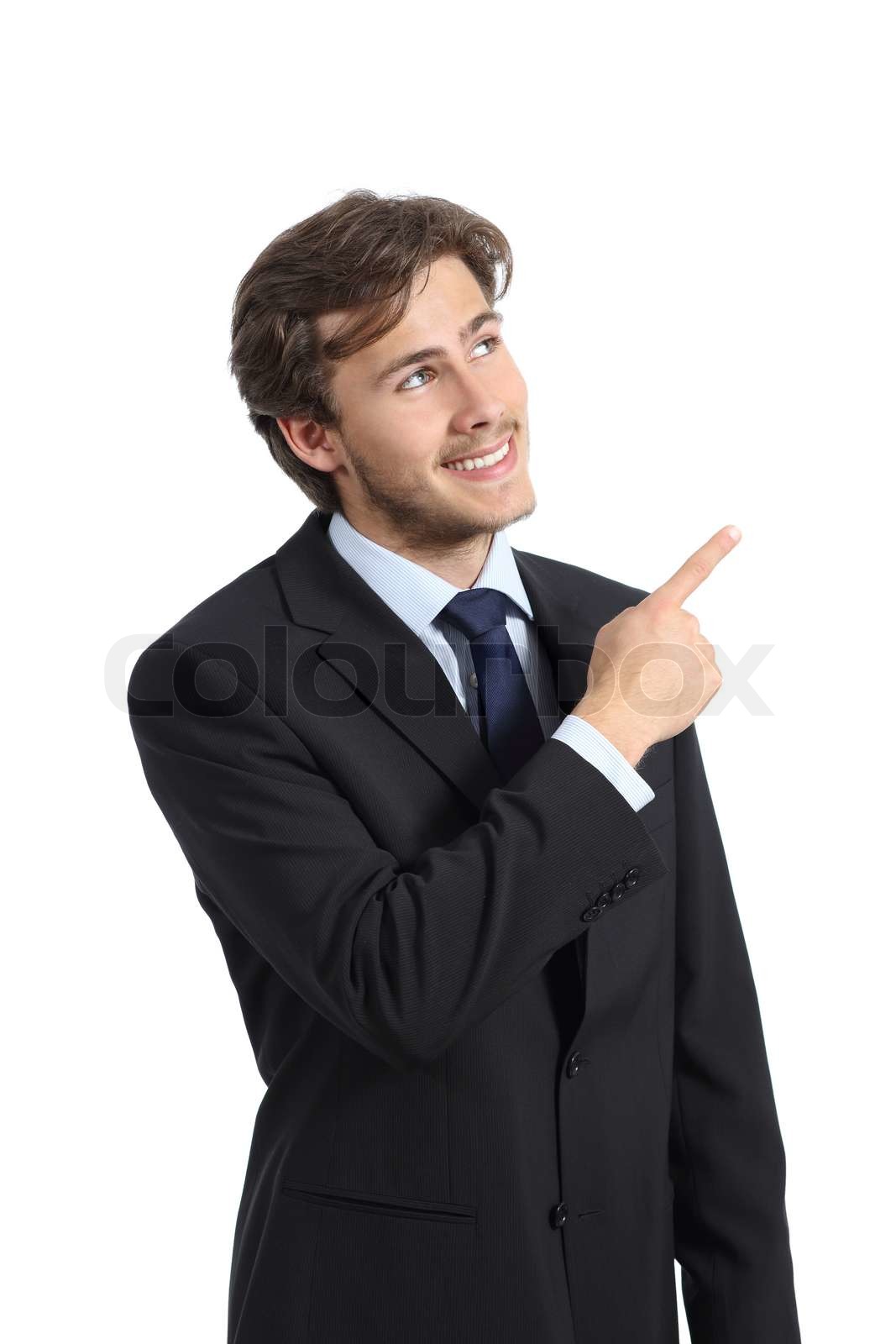 Handsome business man pointing at side presenting a product | Stock