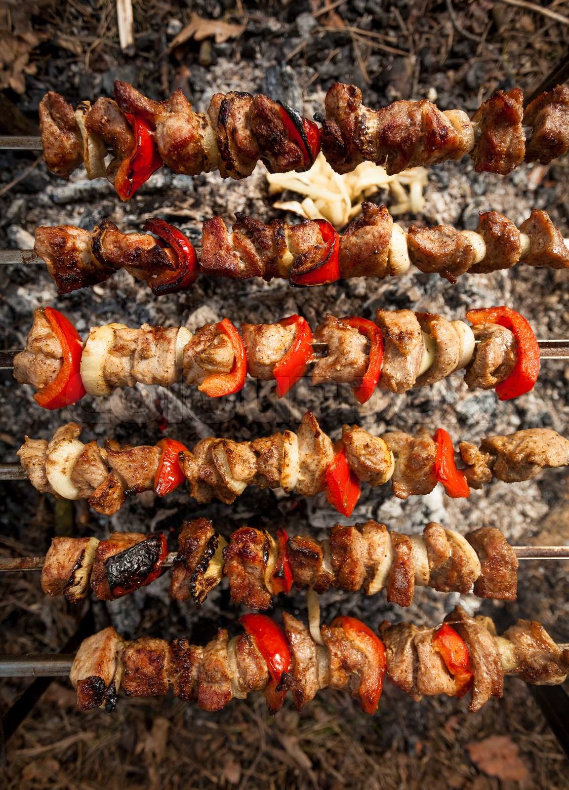 Photo of kebab being roasted on fire Stock image Colourbox