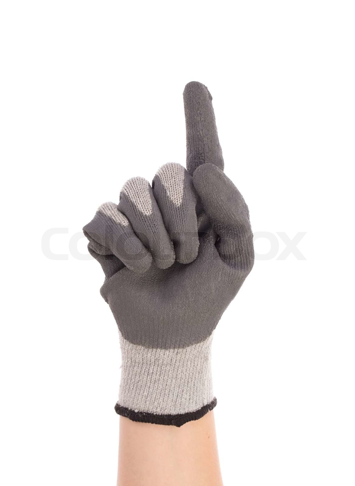 Hand zeigt einen in Gummihandschuh. | Stock Bild | Colourbox