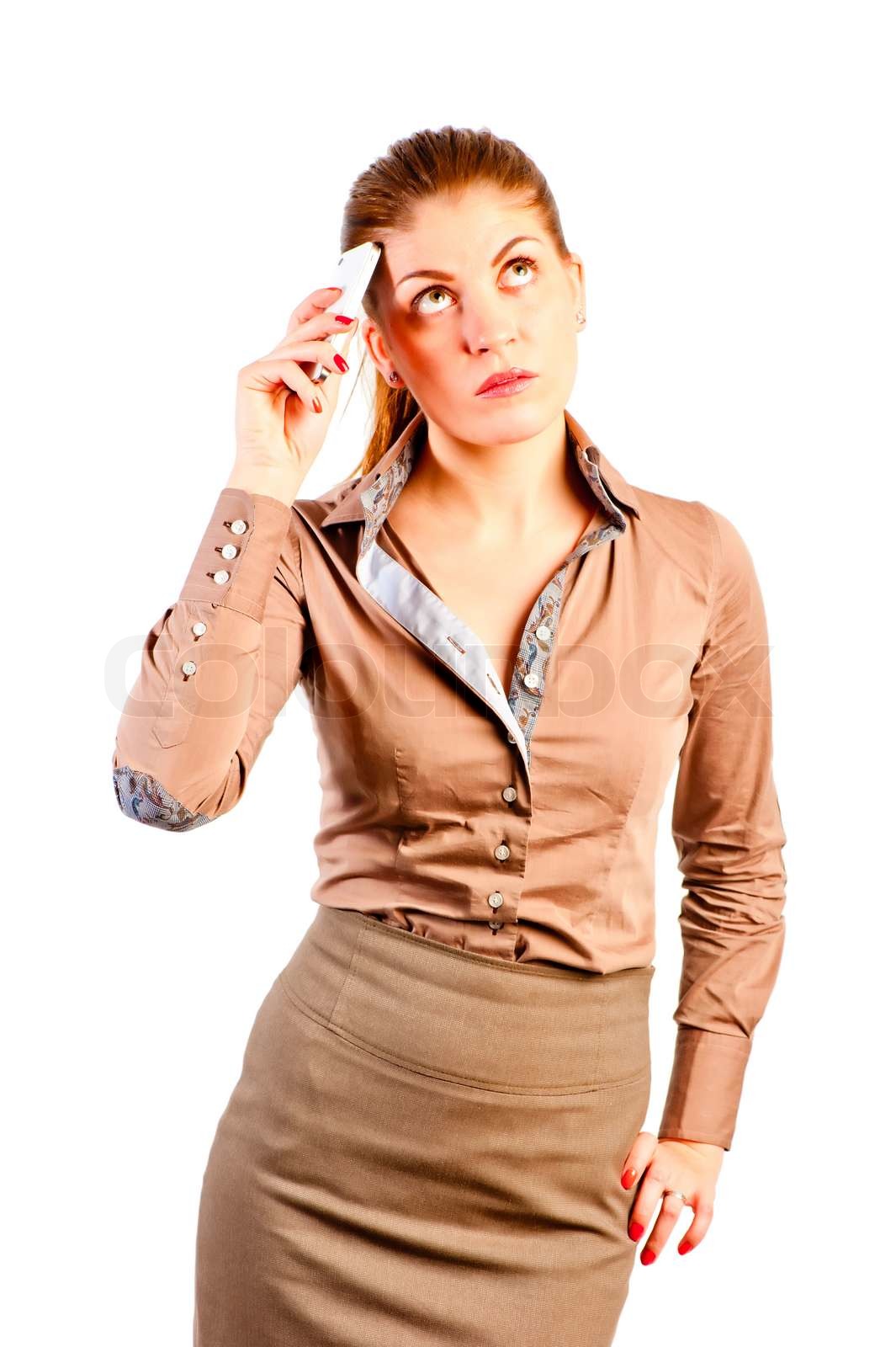 Anmutige Frau mit dem Telefon dachte | Stock Bild | Colourbox