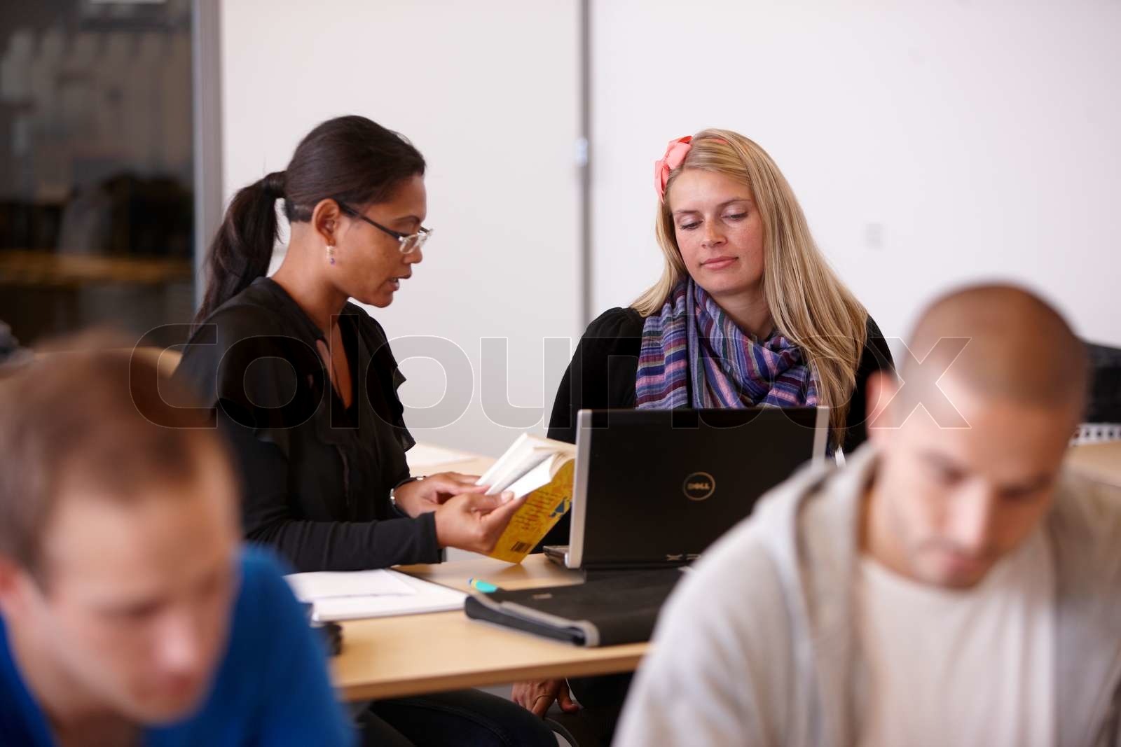 University students exchanging ideas Stock image Colourbox