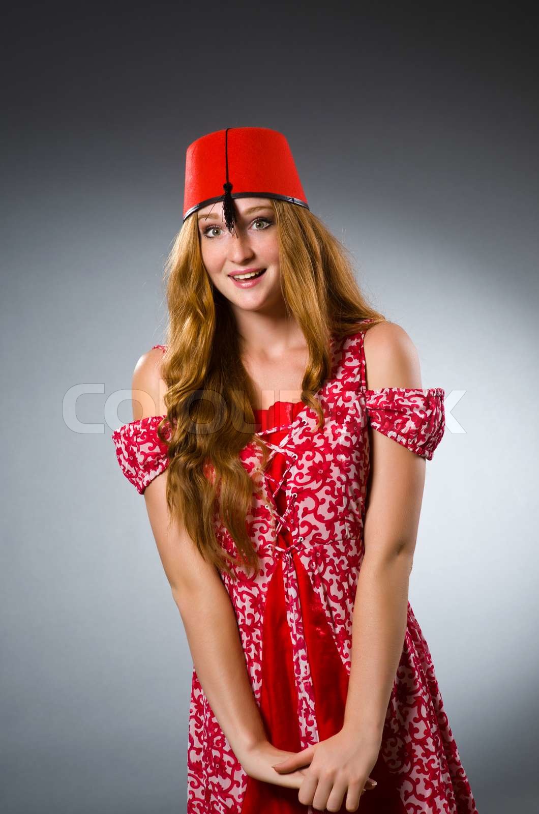 woman-wearing-red-fez-hat-stock-image-colourbox