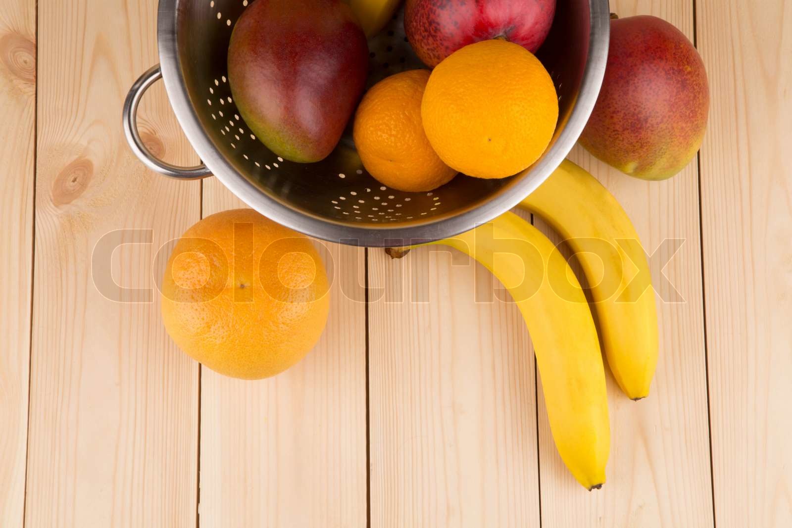 Citrus fruits and bananas Stock image Colourbox