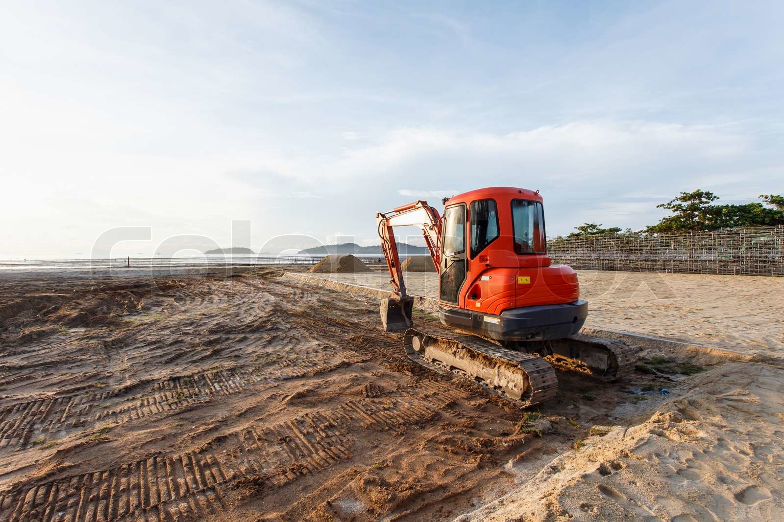 Excavator stand in construction site Stock image Colourbox