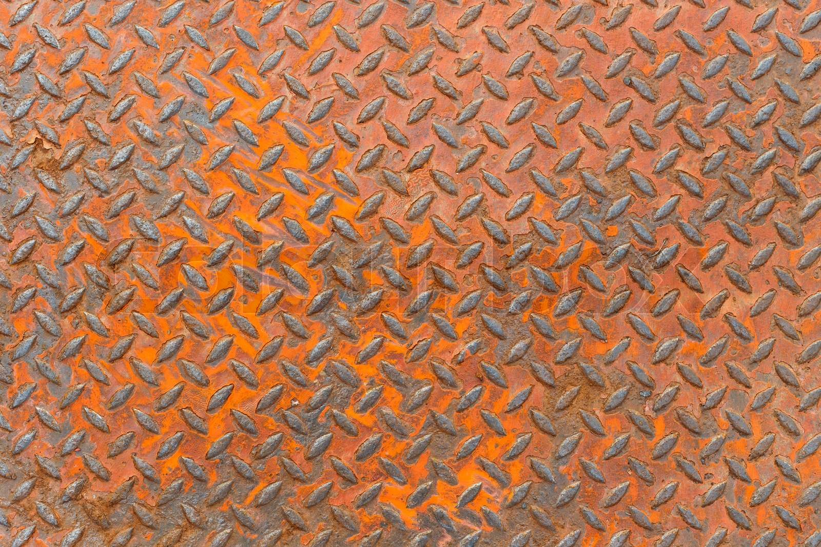 Background of metal diamond plate in red color with rusty | Stock image