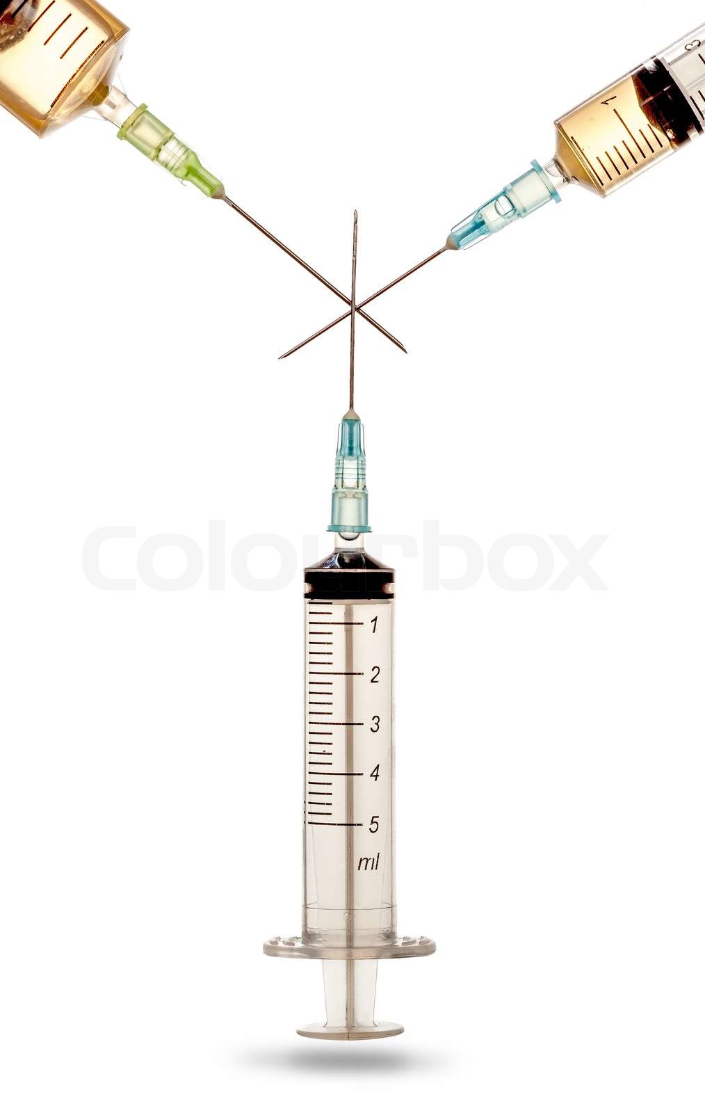 Three syringes with crossed needles Stock image Colourbox