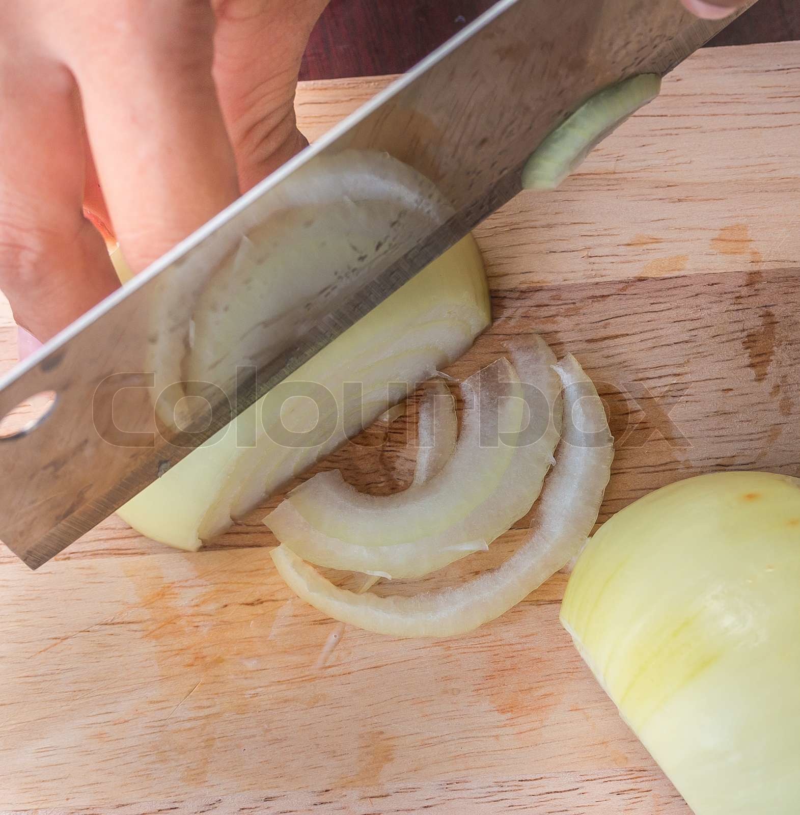 Chopping Onion Means Prepare Food And Cooking Stock image Colourbox