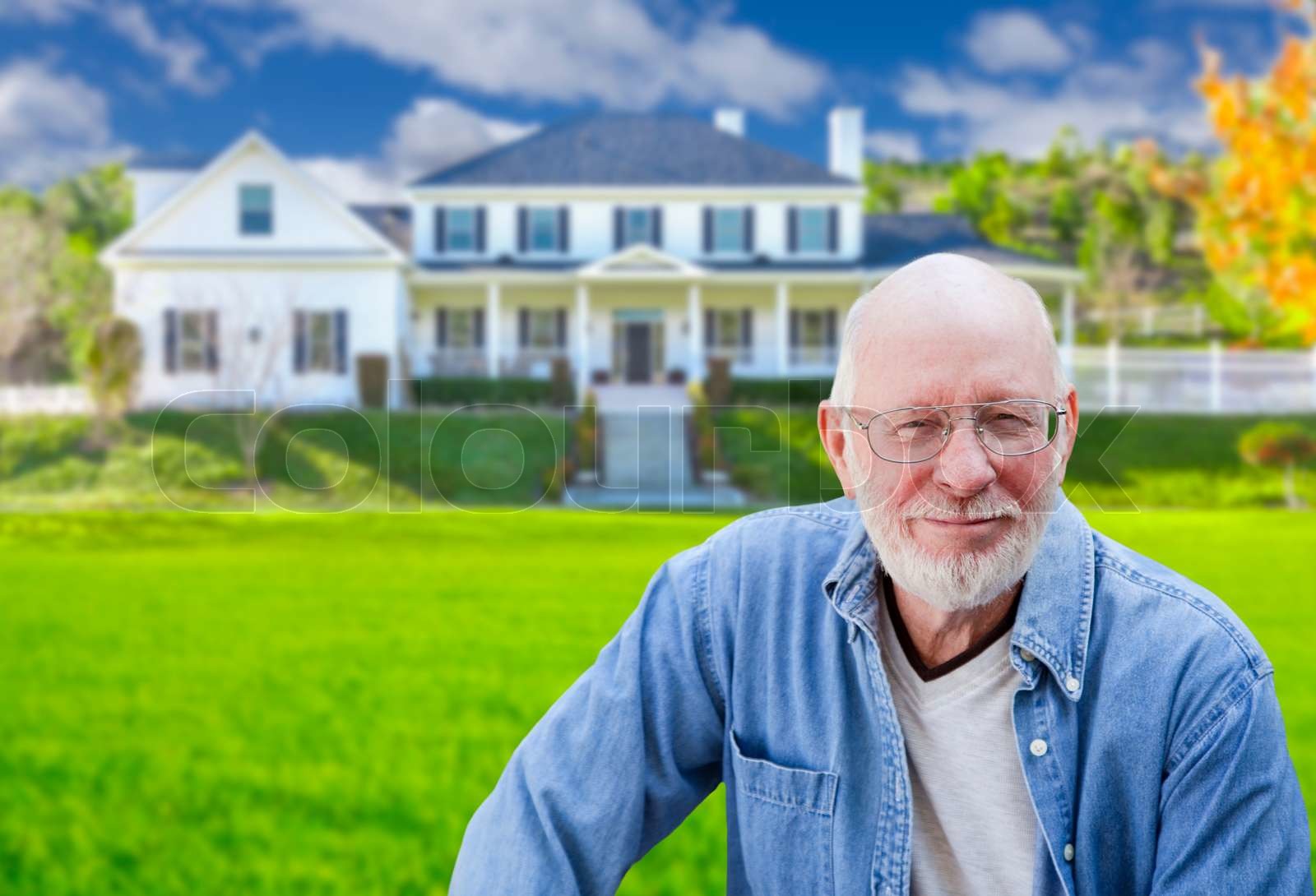 Senior Adult Man in Front of House Stock image Colourbox