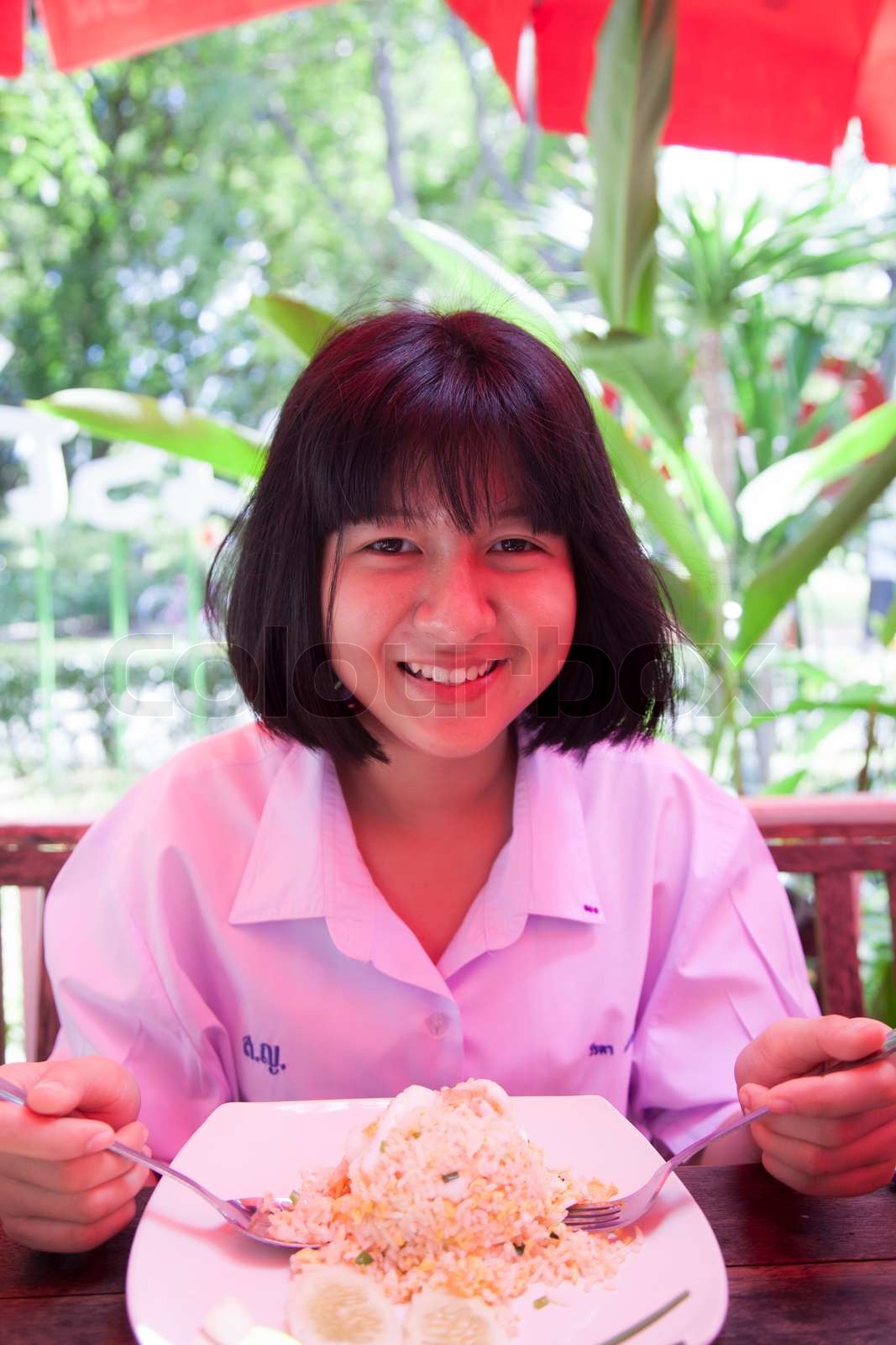 woman-to-eat-fried-rice-stock-image-colourbox