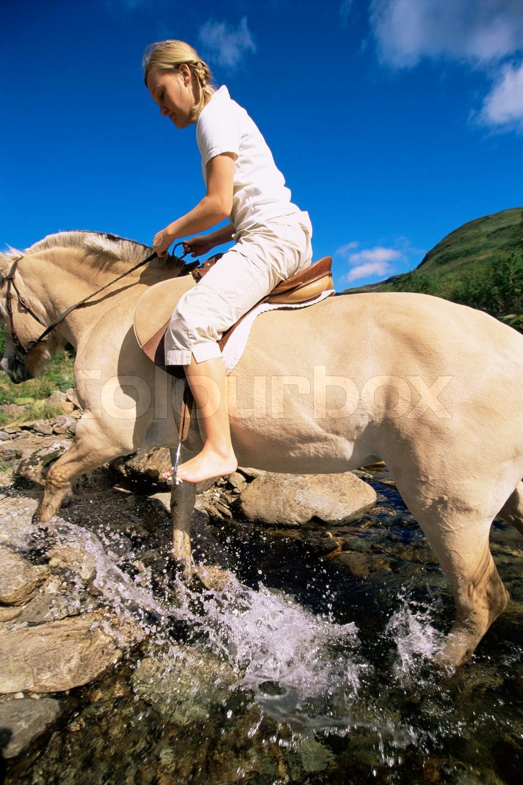Bare Foot Riders woman, barefoot, riding | Stock image | Colourbox