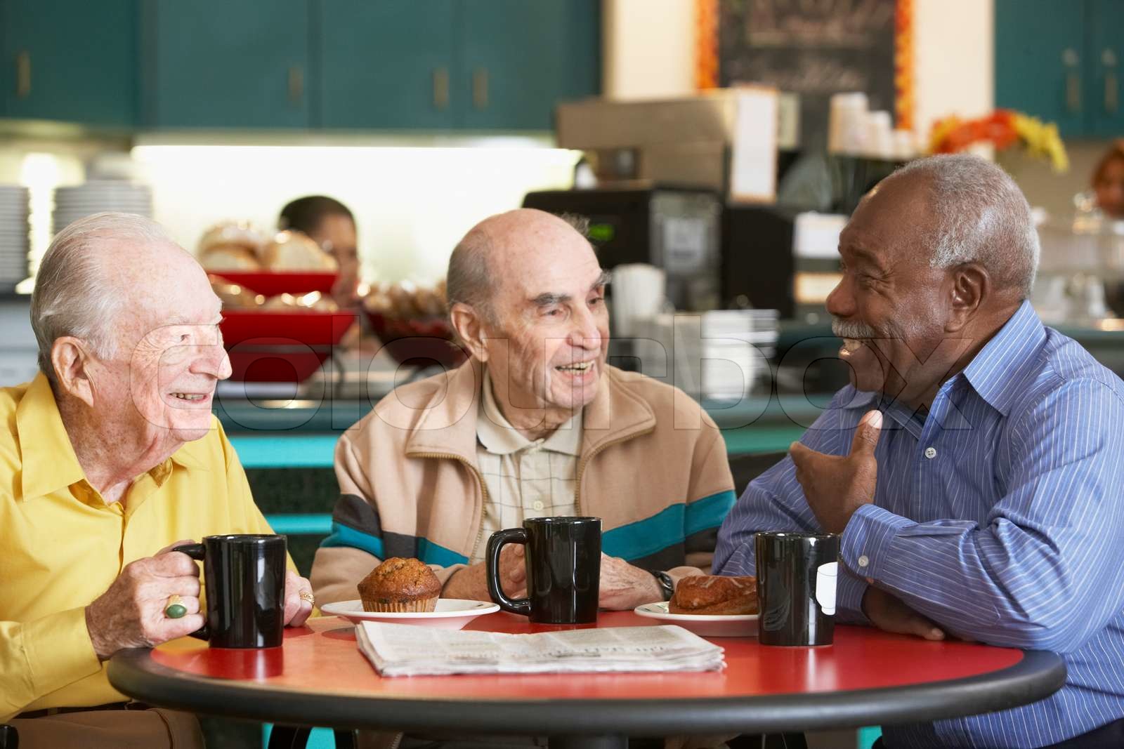 Senior men drinking tea together Stock image Colourbox
