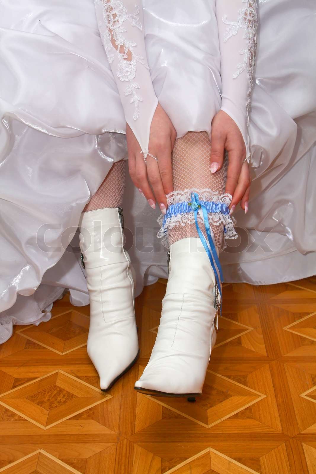 wedding garter from the bride on leg Stock image Colourbox