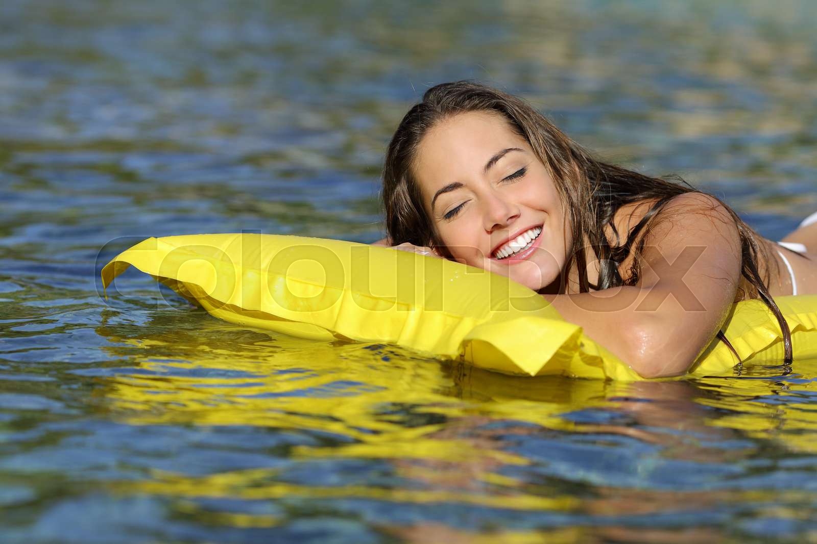 Happy girl bathing on the beach in summer vacation | Stock image ...
