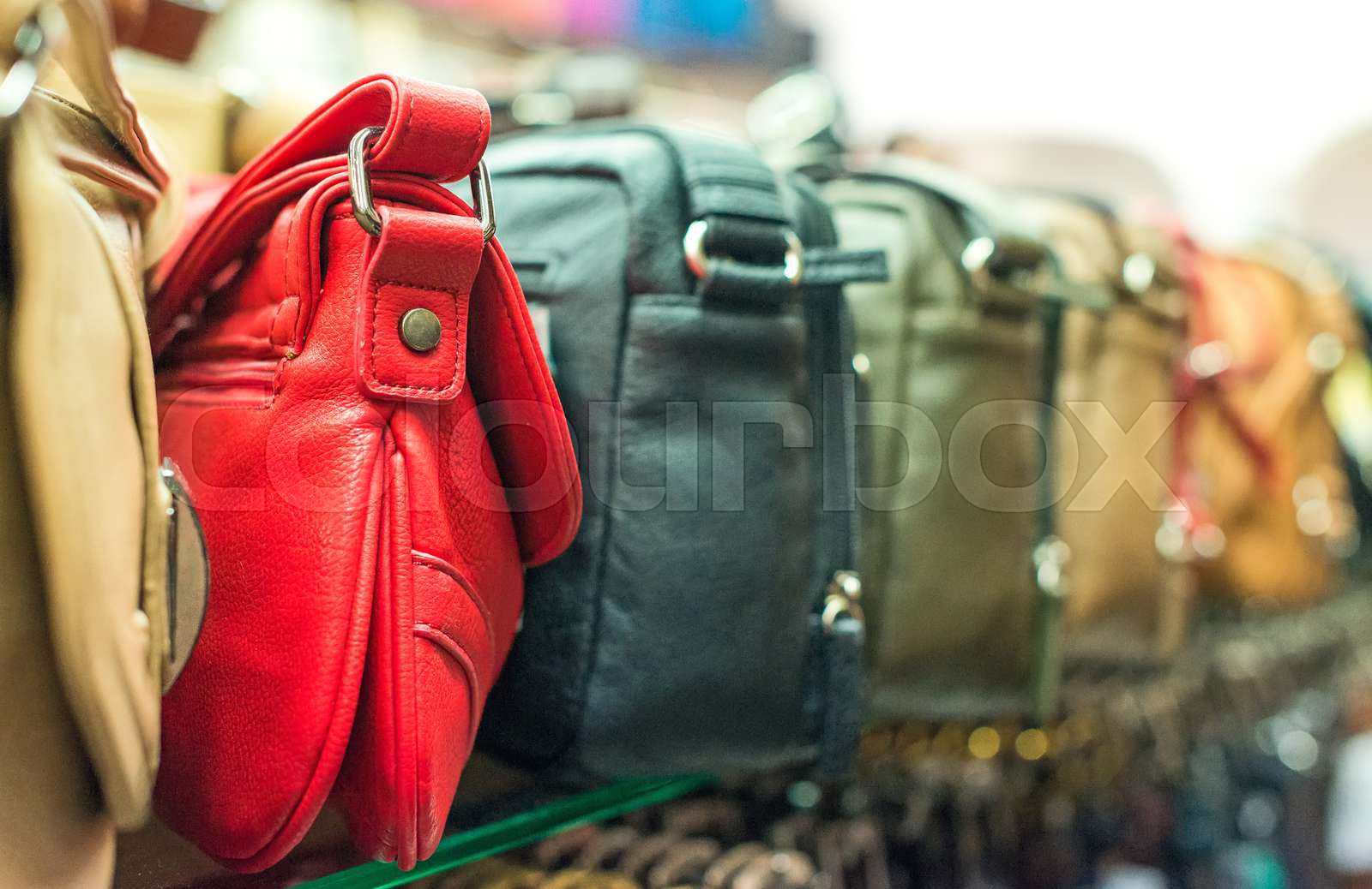 Leather handbags collection in the store. | Stock image | Colourbox
