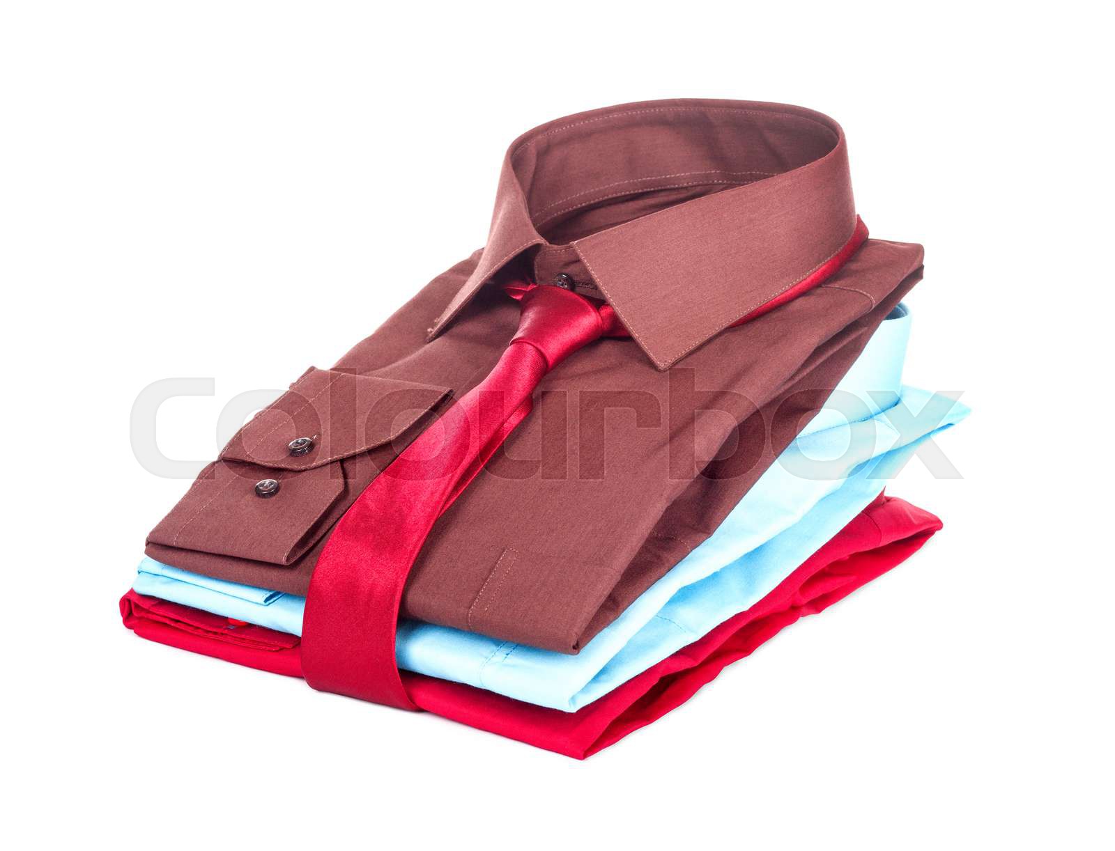 Stack of Shirts, Isolated over white | Stock image | Colourbox