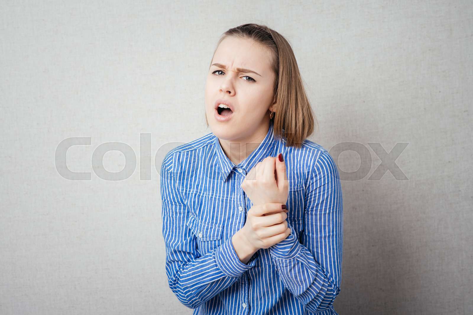 girl-sore-wrist-and-need-help-stock-image-colourbox