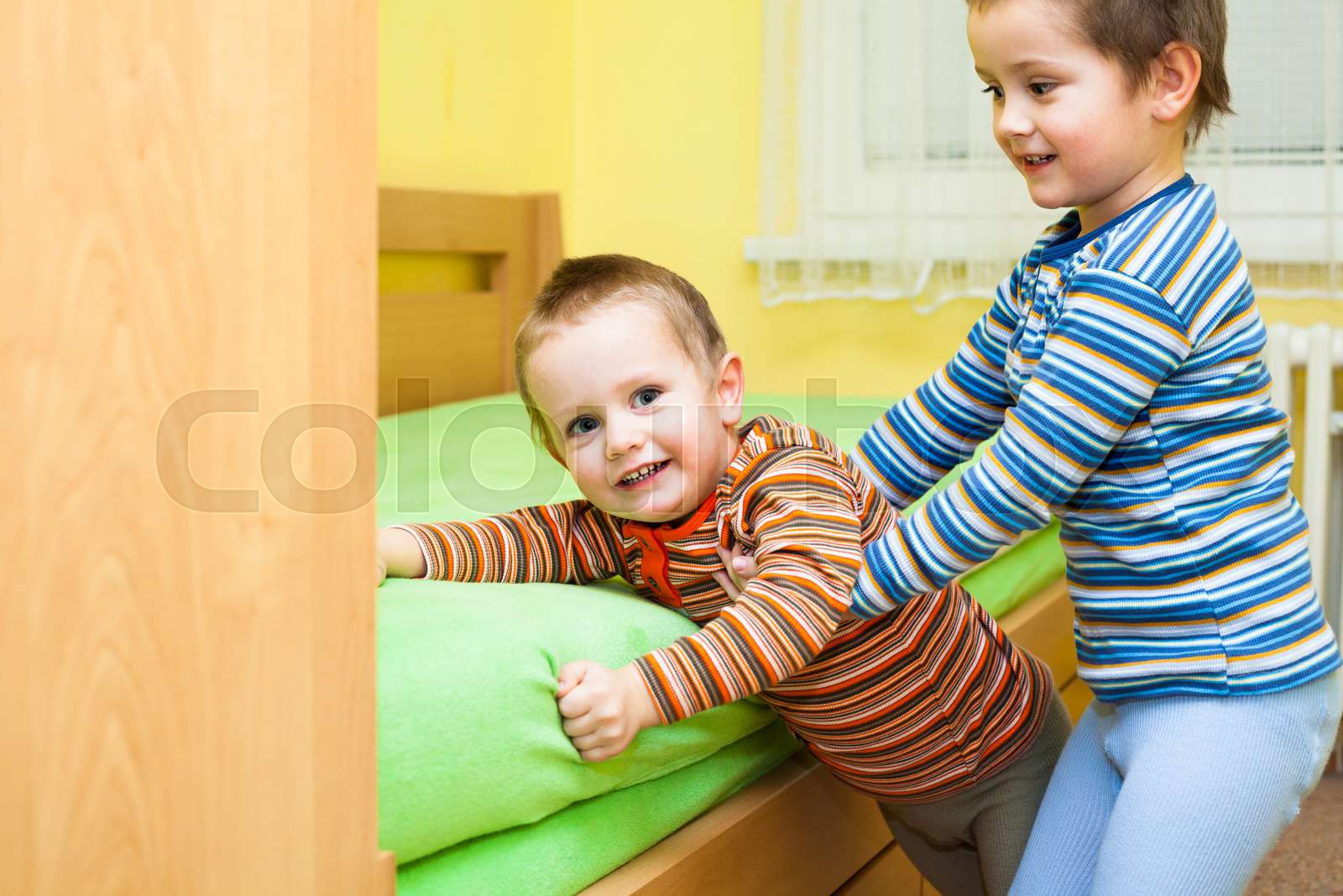 Two children playing together | Stock image | Colourbox