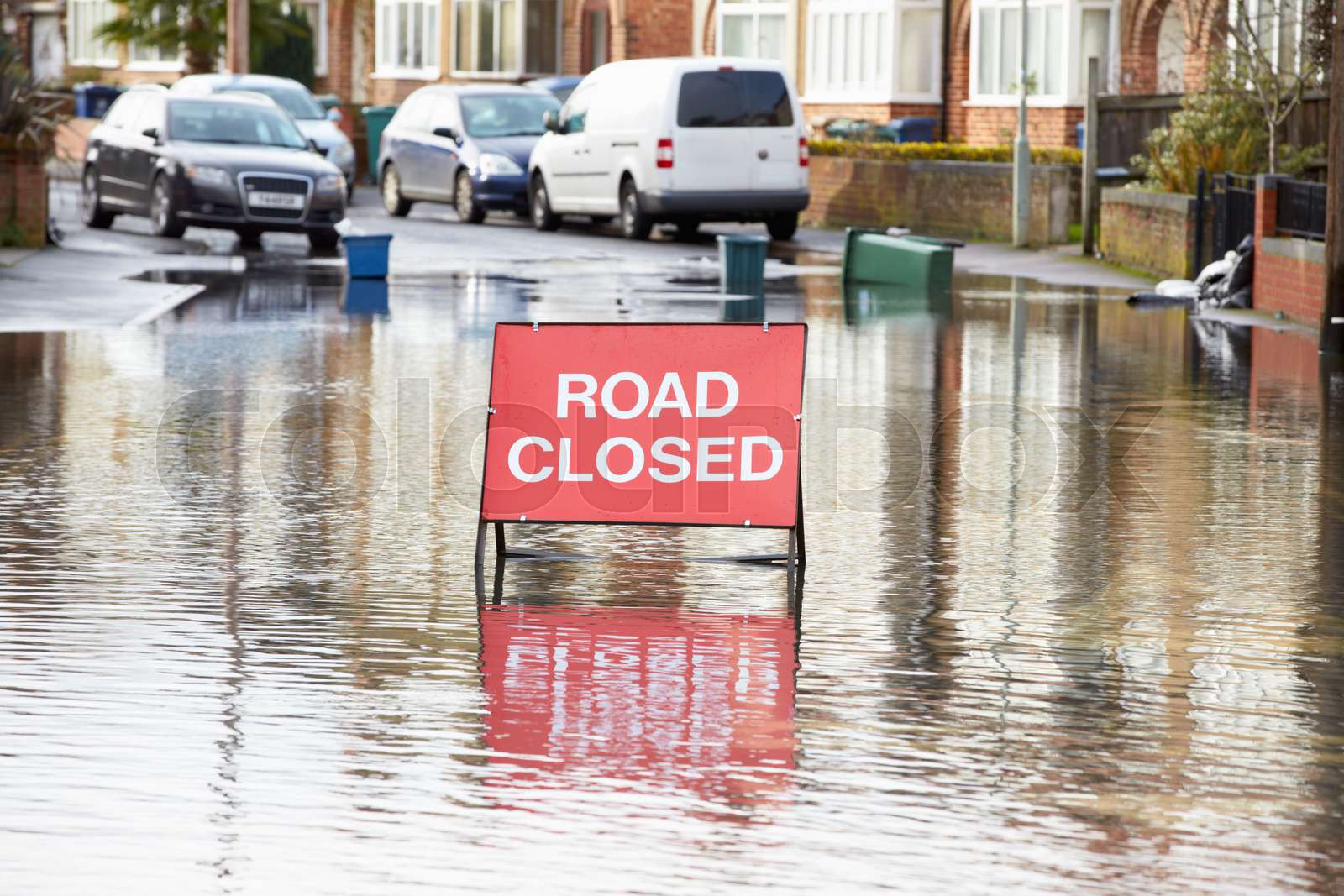 Warning Traffic Sign On Flooded Road | Stock image | Colourbox