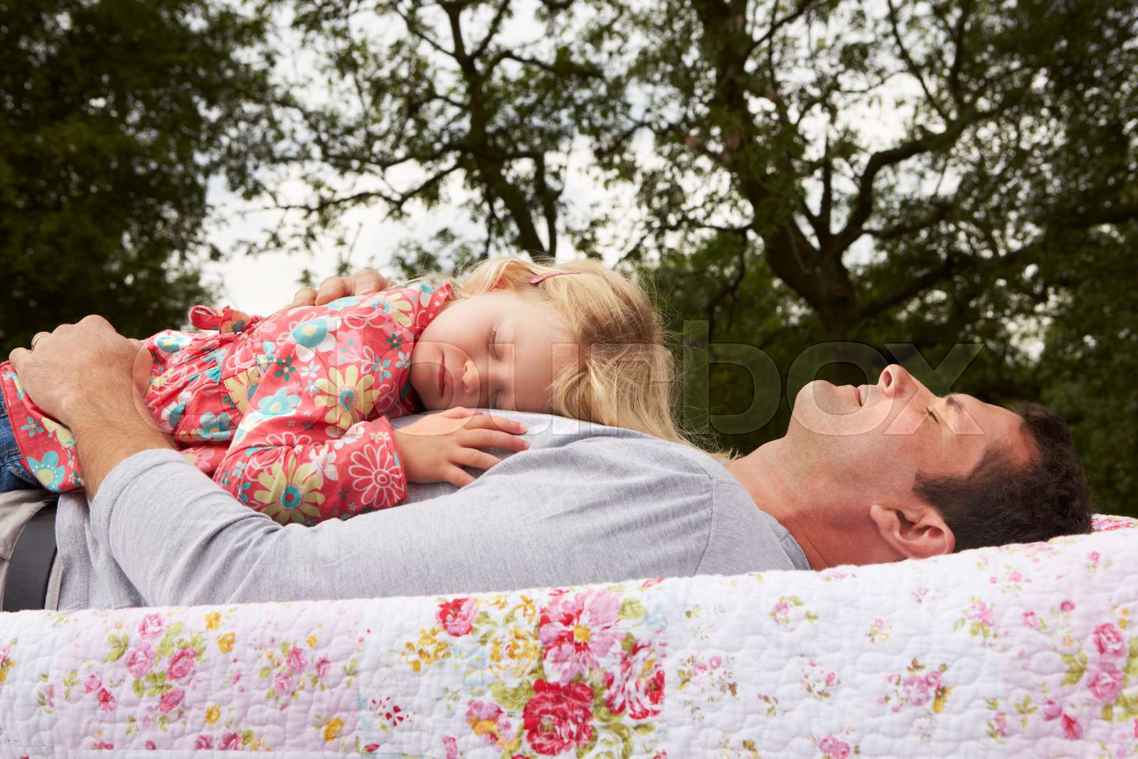 Father With Daughter Relaxing On Camping Holiday | Stock image | Colourbox