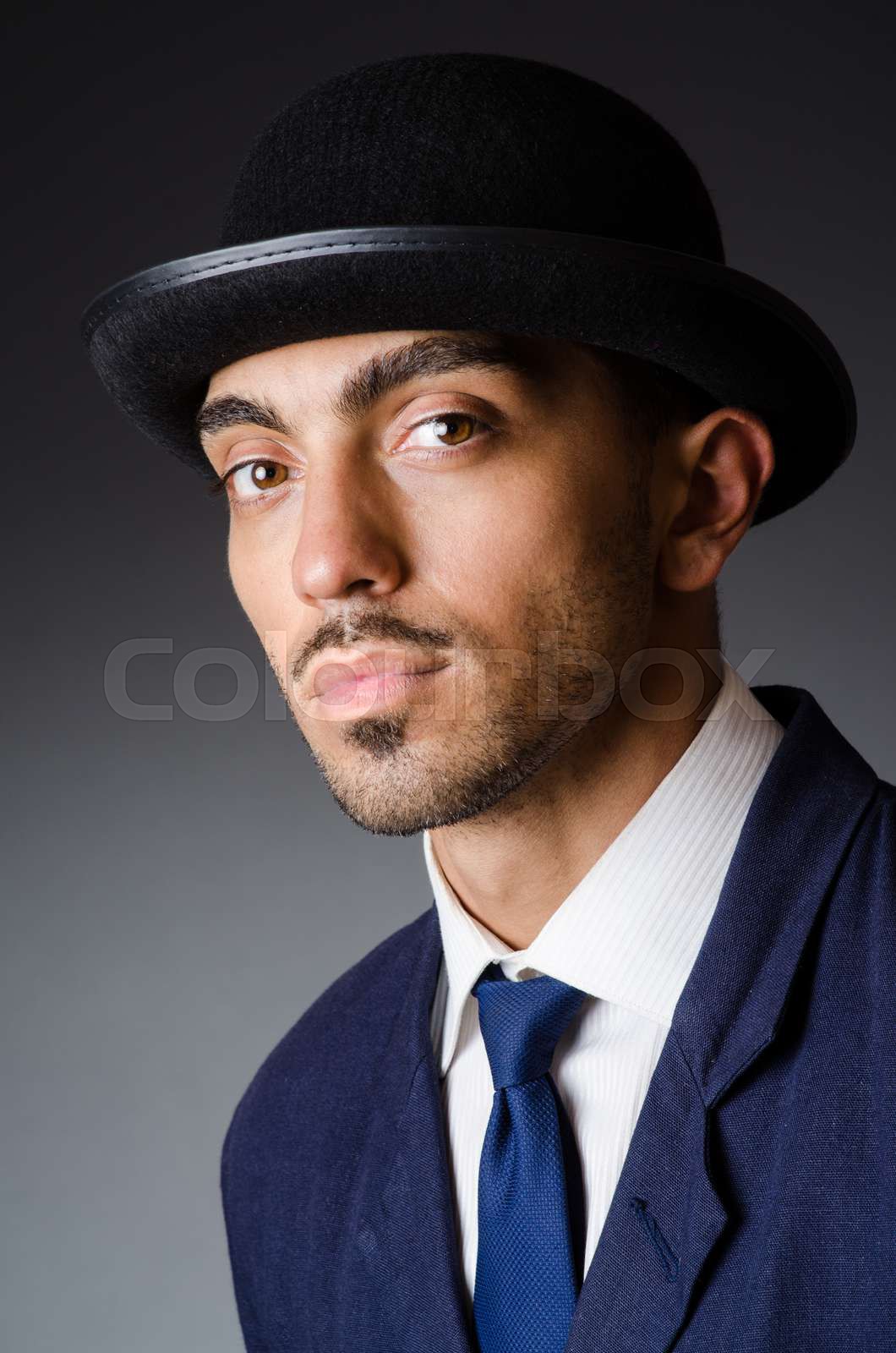 Man with hat in vintage concept stock image colourbox