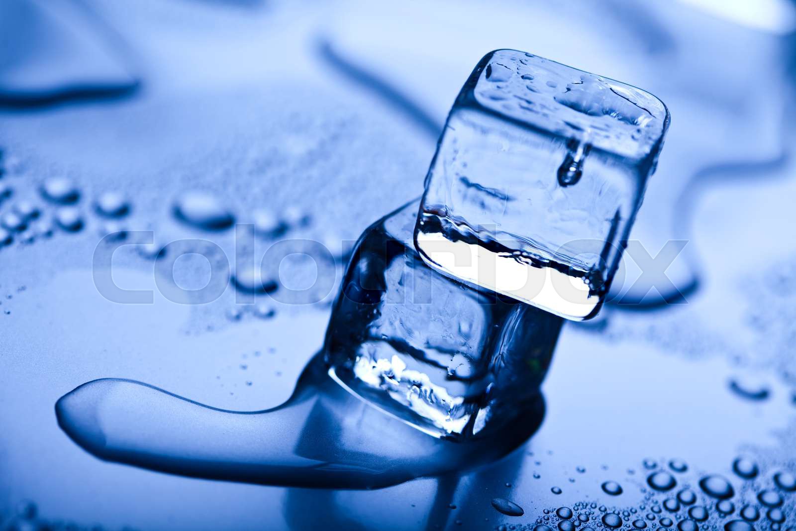 Blue and shiny ice cubes stock image colourbox