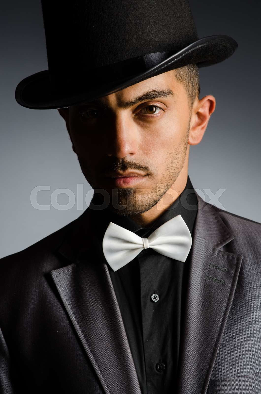 Man with hat in vintage concept stock image colourbox