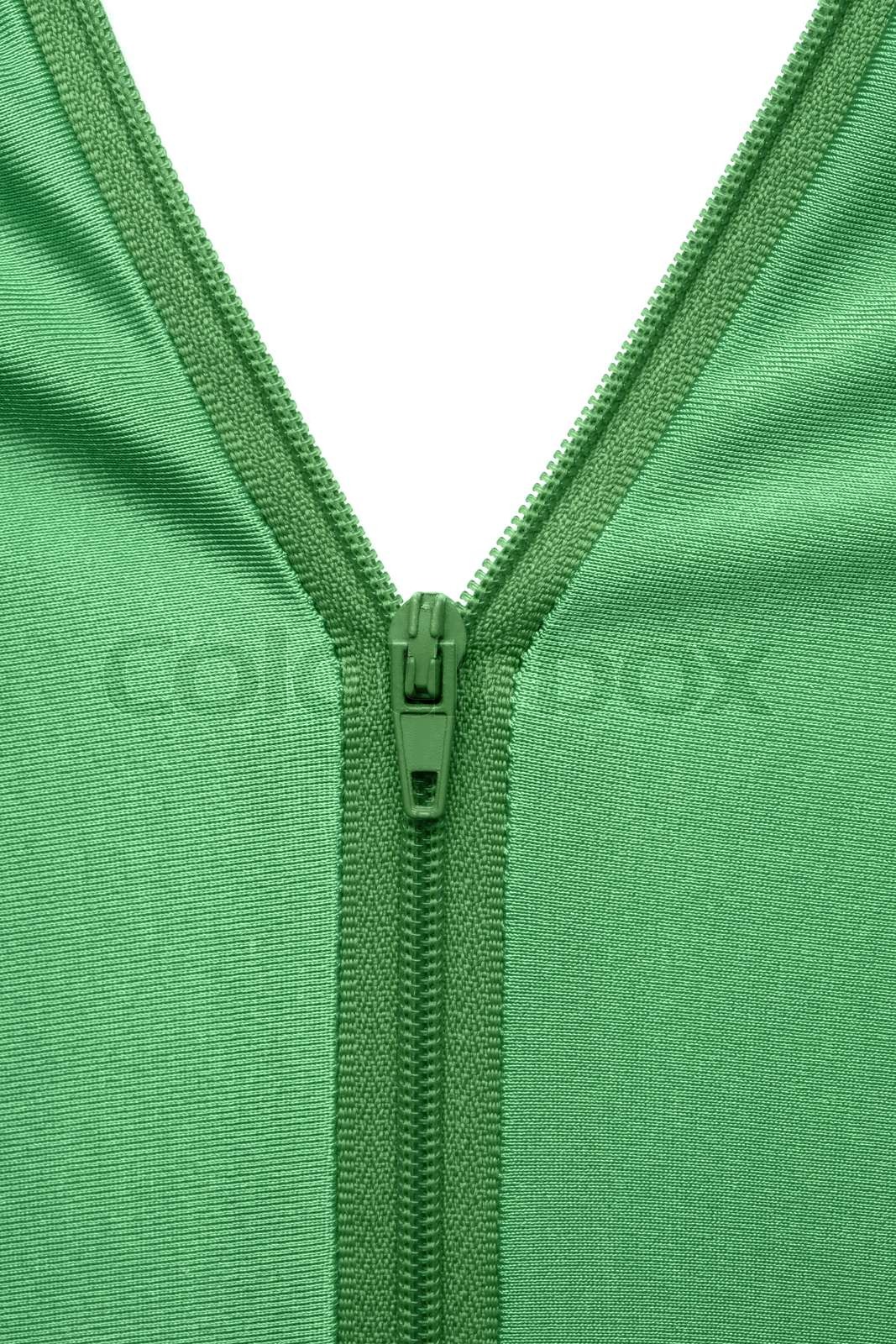 Zipper of a green garment Stock image Colourbox