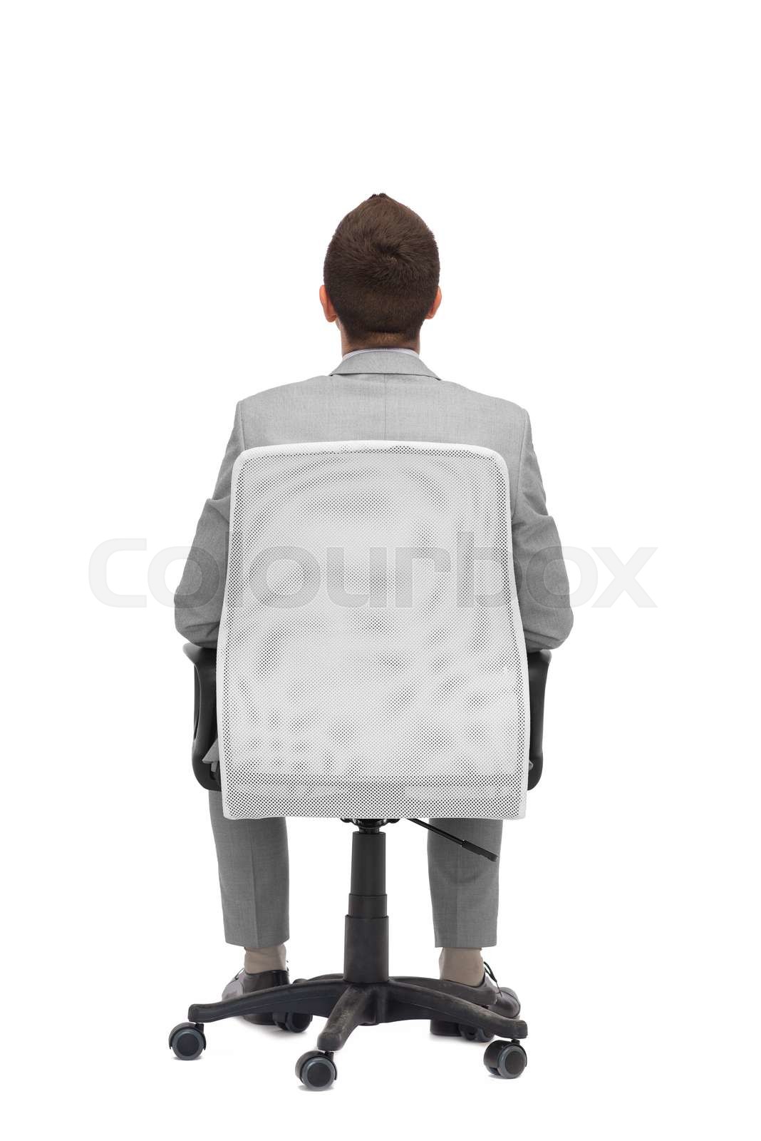 businessman sitting in office chair from back Stock image Colourbox