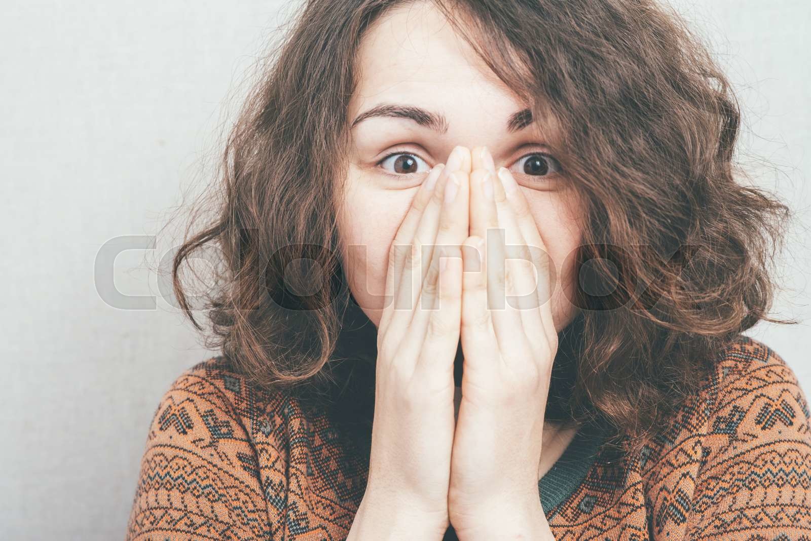 girl covers her face with her hands | Stock image | Colourbox