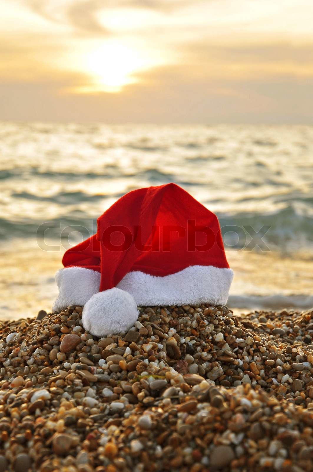 Santa Claus hat on the beach | Stock image | Colourbox