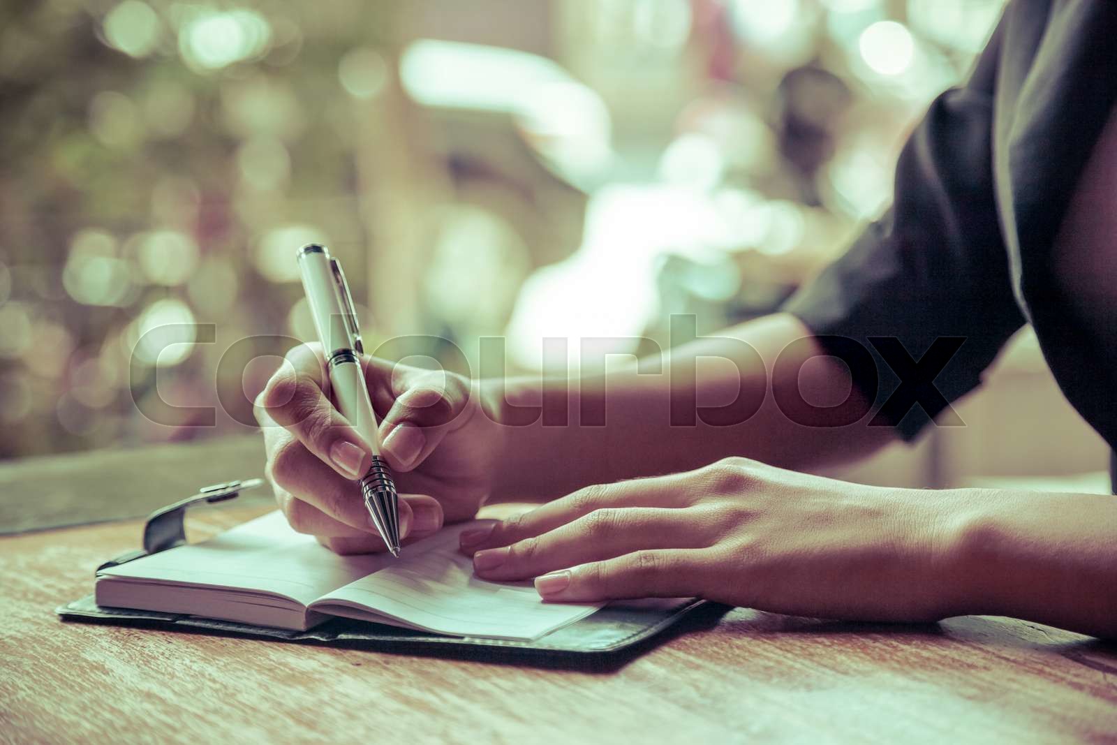 writing a journal | Stock image | Colourbox