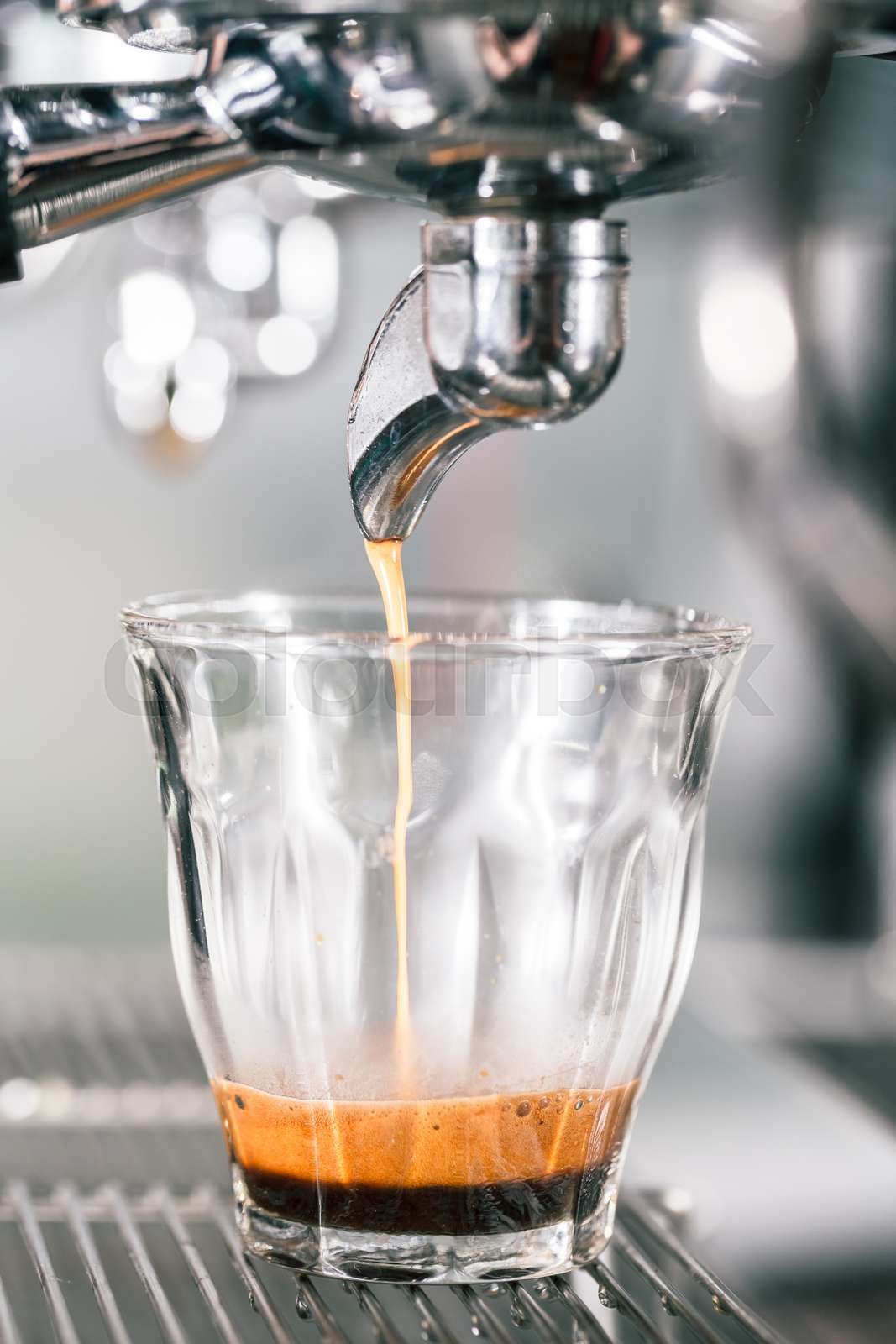 Running Coffee Machine Espresso running in glass on professional coffee maker | Stock image ...