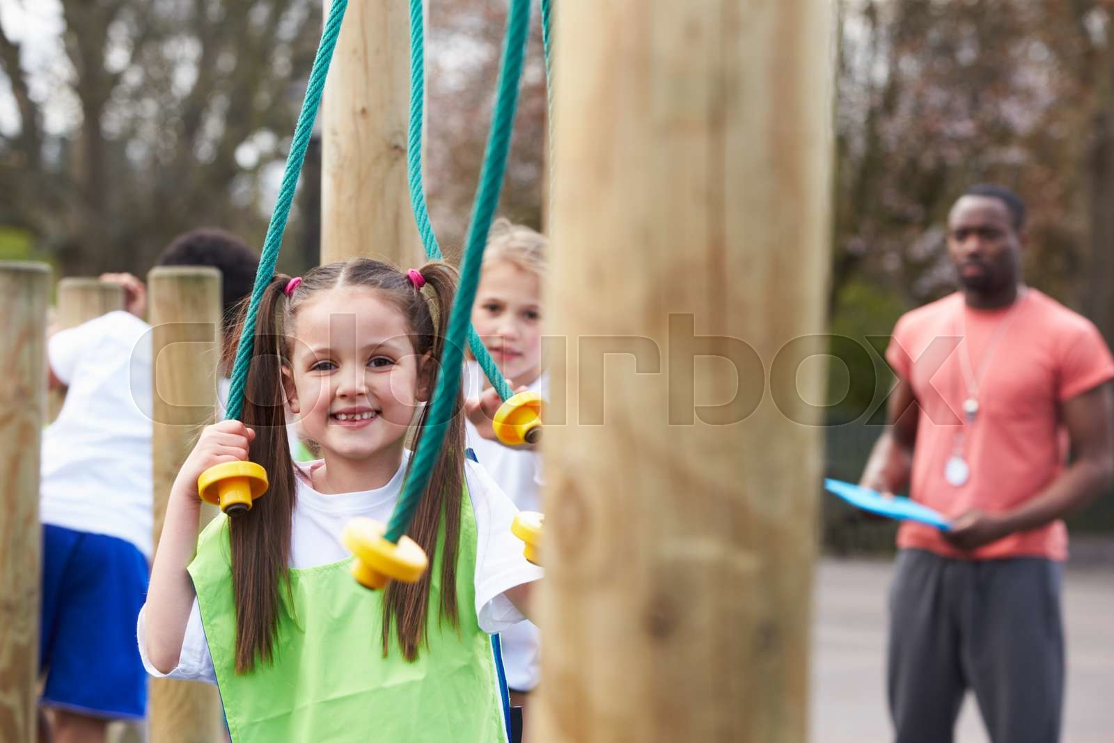 Group Of Children In School Physical Education Class | Stock image