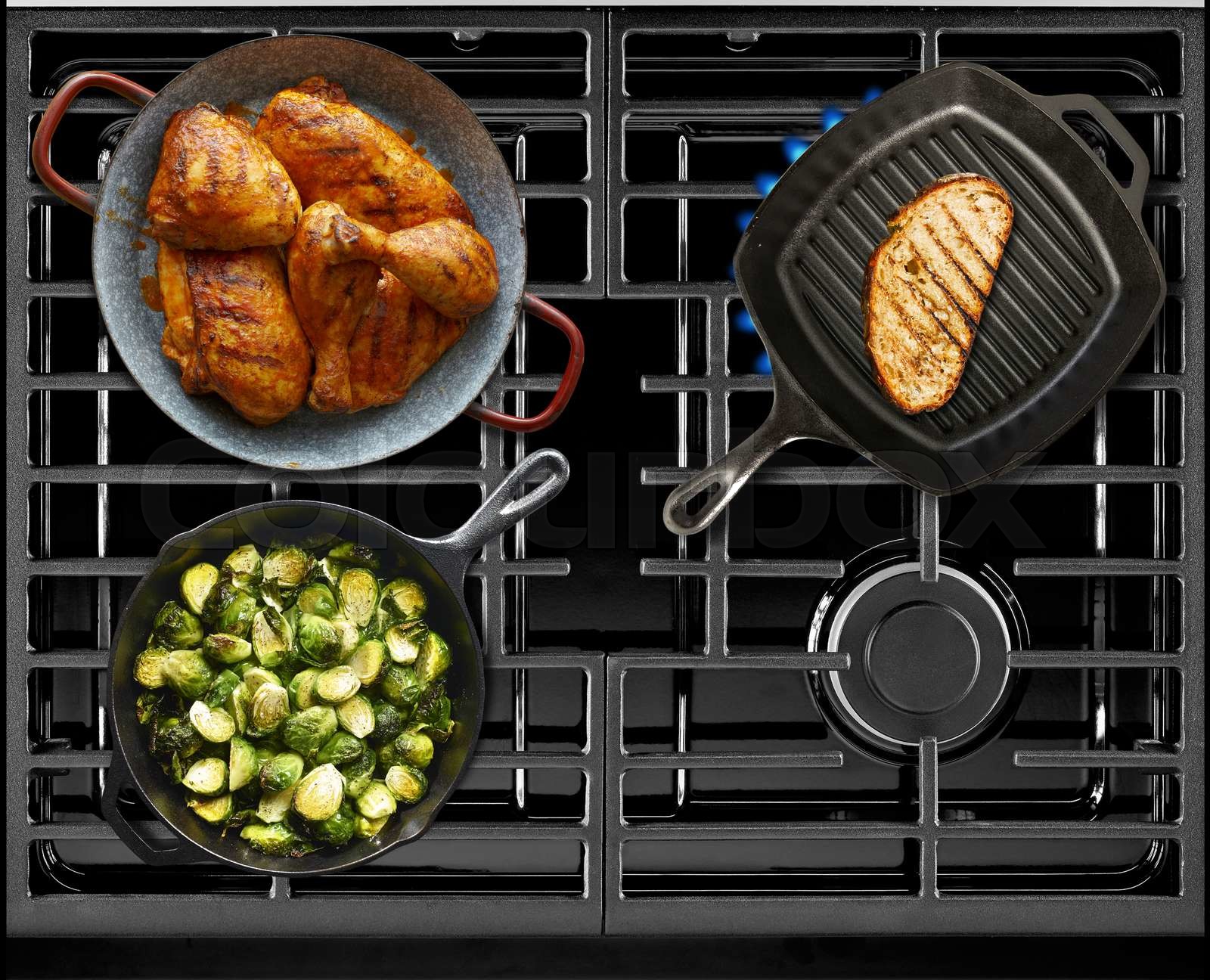 Cooking on gas stove | Stock image | Colourbox