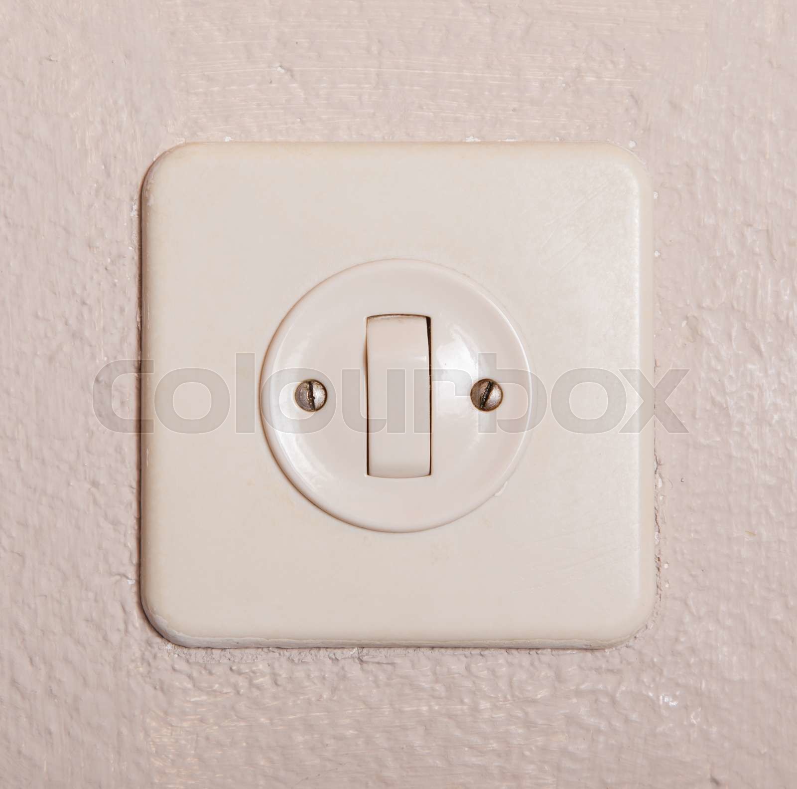 Press turn on/off electrical switch | Stock image | Colourbox