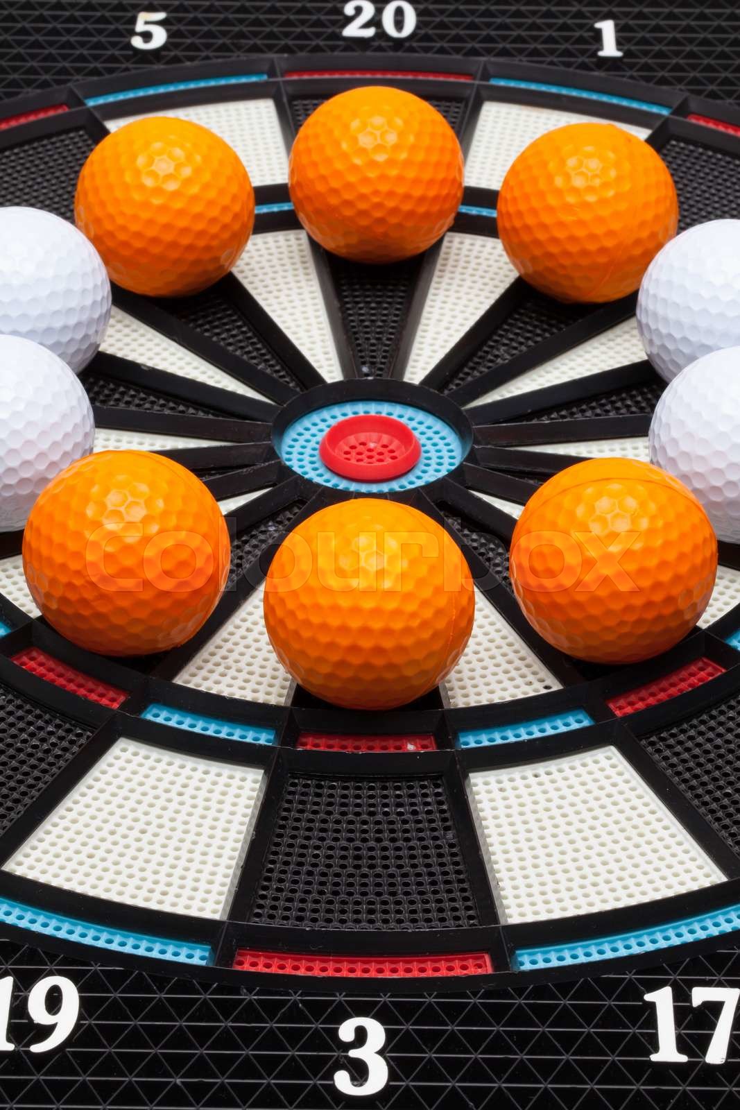 Detail Dartboard With Golf Balls Stock Image Colourbox detail-dartboard-with-golf-balls-stock-image-colourbox