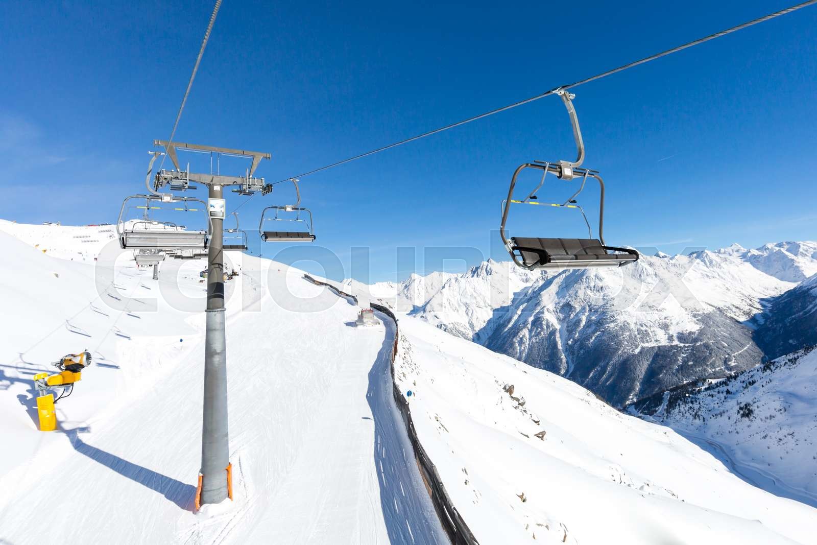 Chair lift and ski slope | Stock image | Colourbox