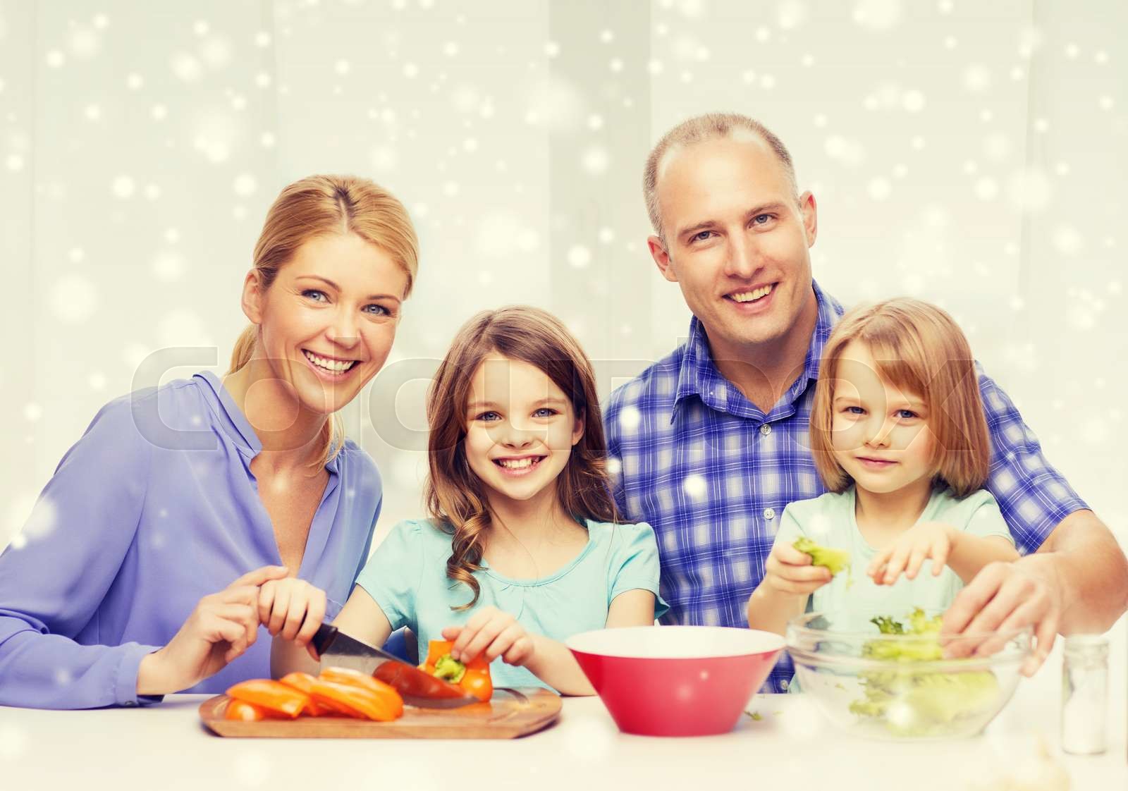 happy family with two kids making dinner at home | Stock image | Colourbox