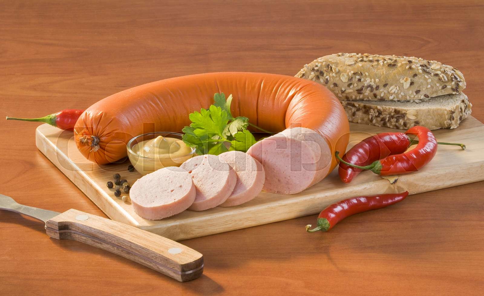 Soft salami and bread roll Stock image Colourbox