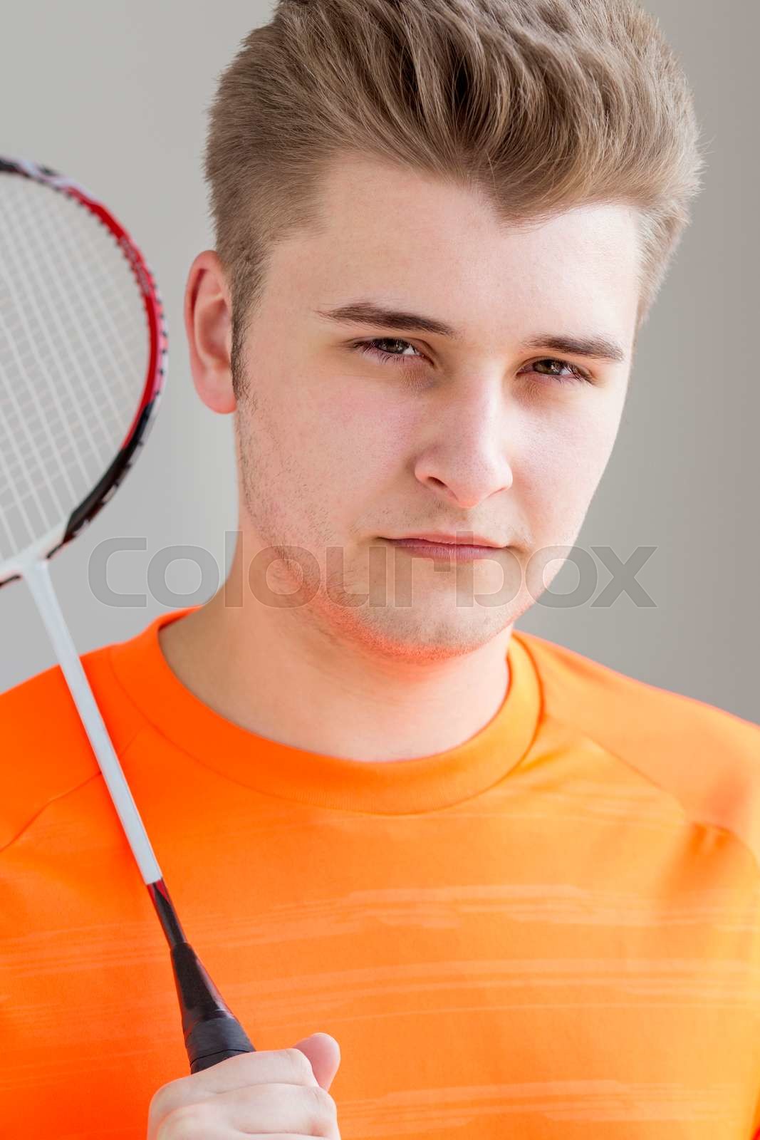 Teenage badminton player Stock image Colourbox
