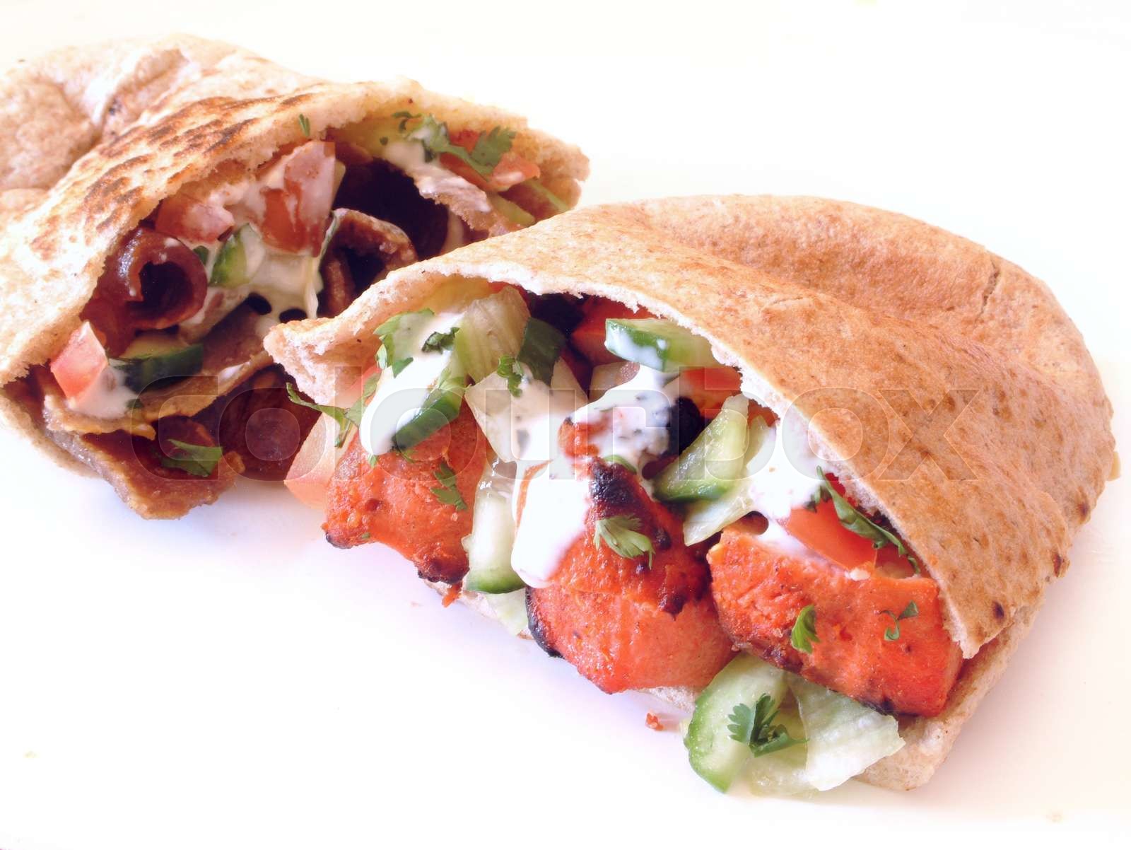 tikka chicken flat bread pitta Stock image Colourbox