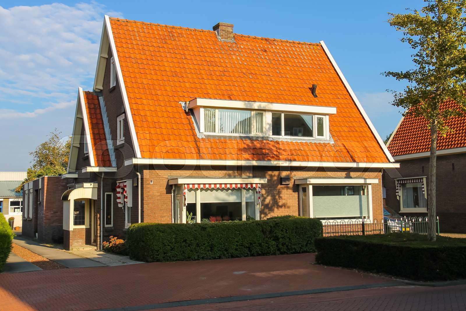 Picturesque residential houses in small Dutch town Zwanenburg, the