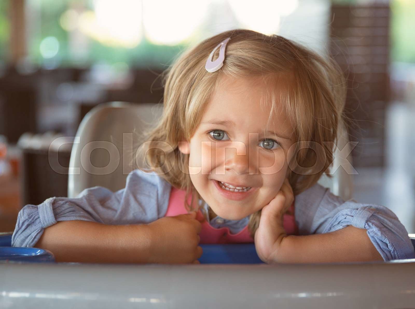 Playful little girl | Stock image | Colourbox