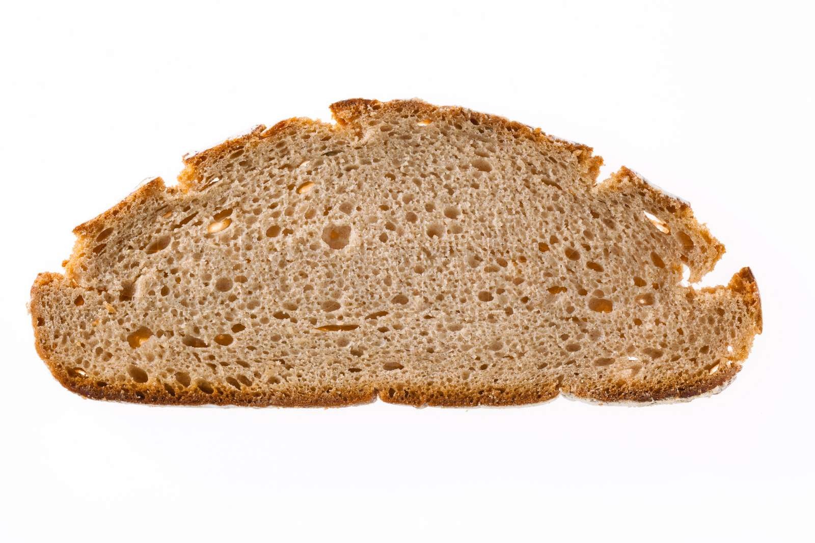 Closeup von einer Scheibe Brot . Stock Bild Colourbox
