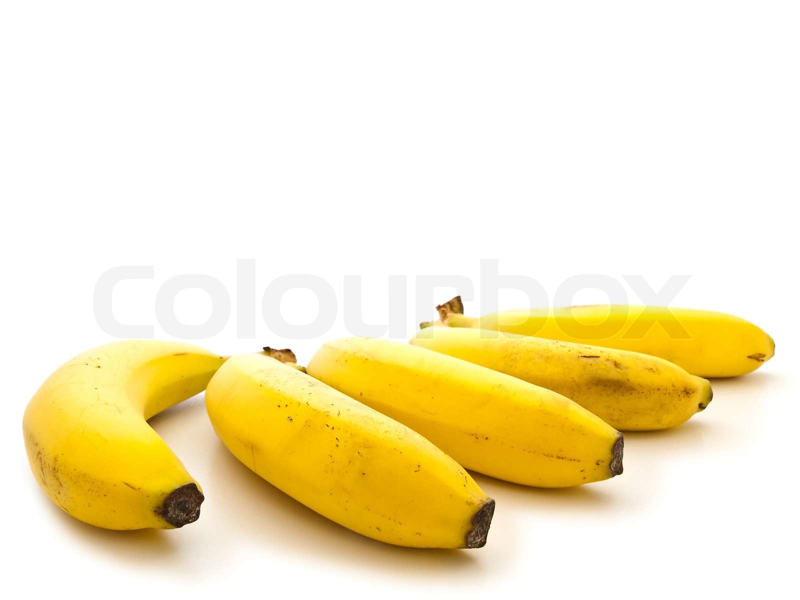 billede af den gule banan mod den hvide baggrund | Stock foto | Colourbox