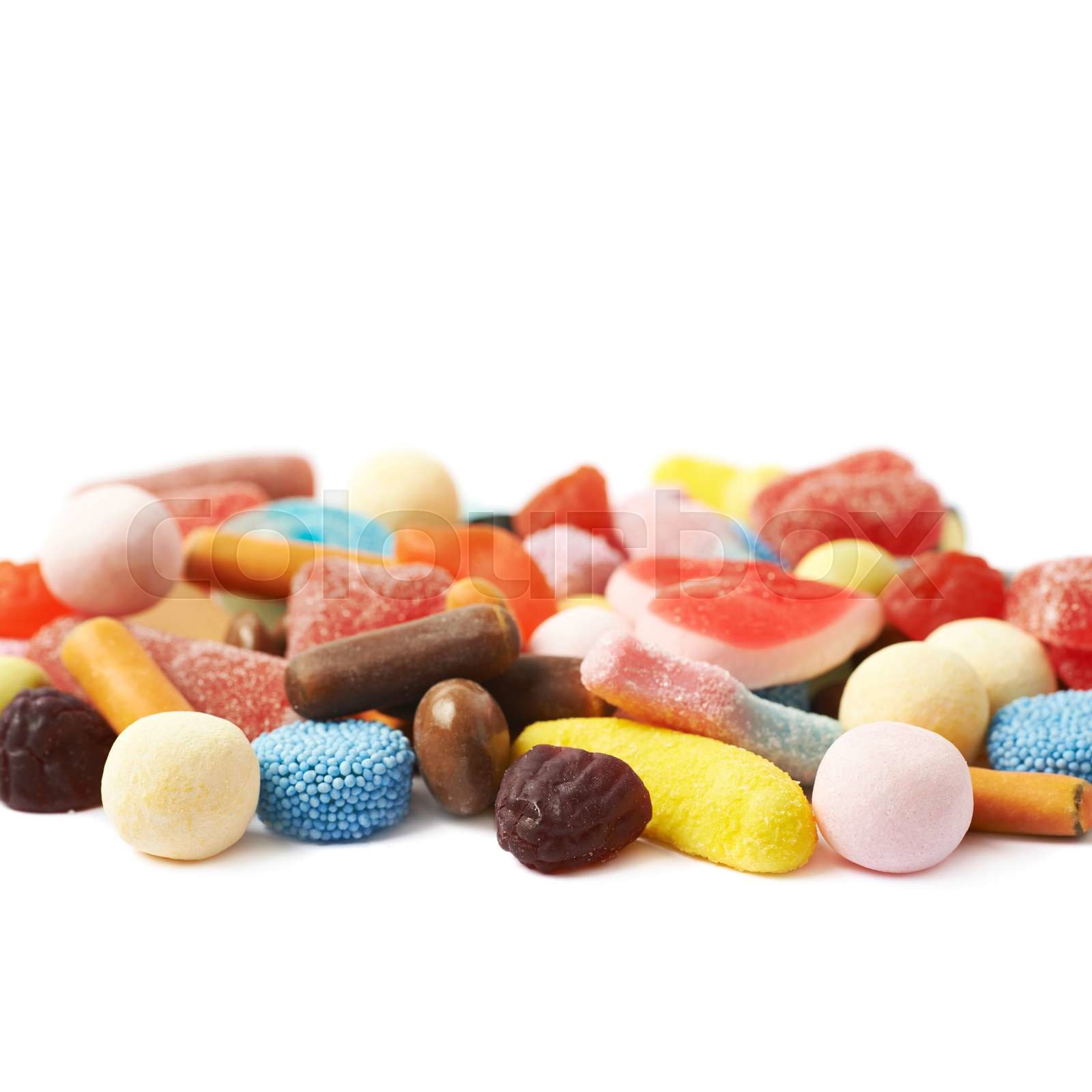 Pile of multiple different candies isolated Stock image Colourbox