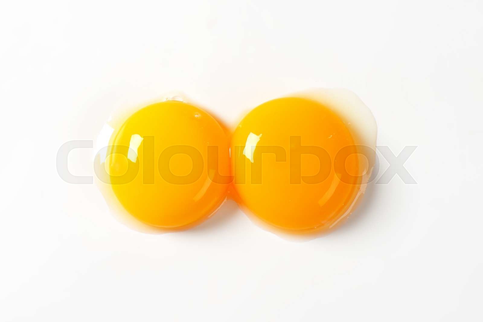 Raw egg yolks Stock image Colourbox