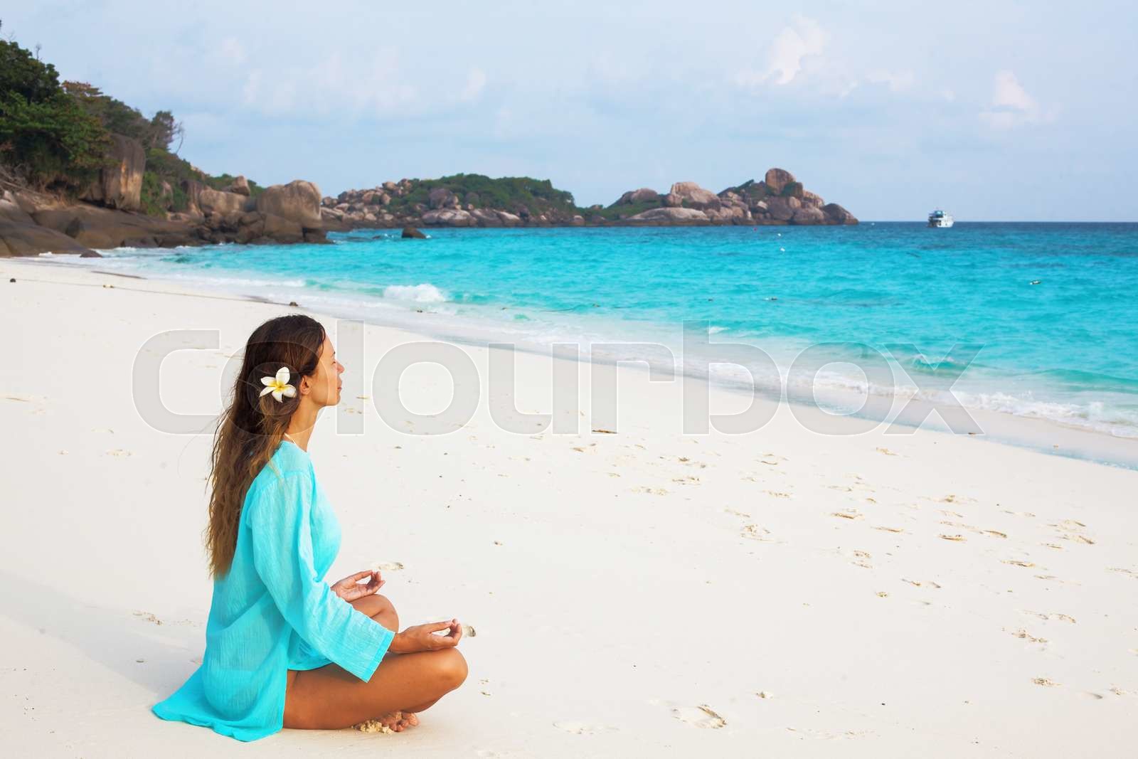 Girl on a beach Stock image Colourbox