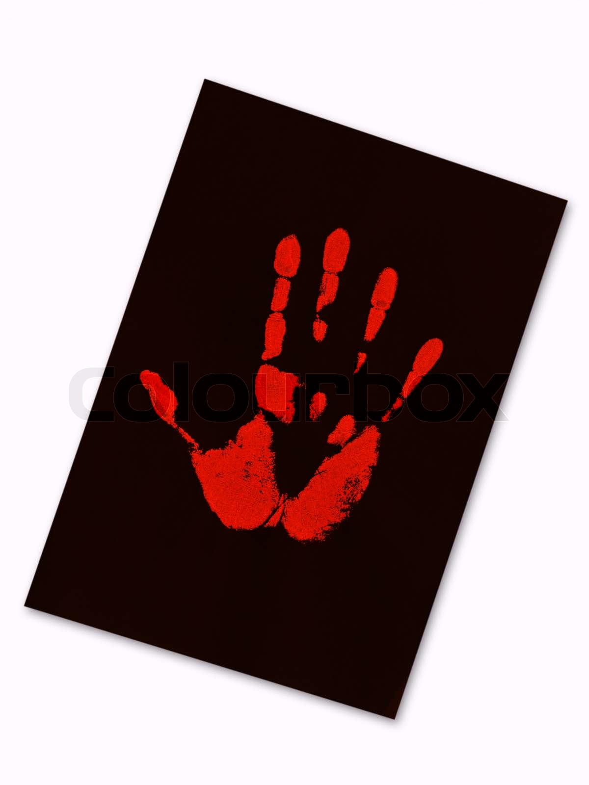 red hand print on the black paper | Stock image | Colourbox